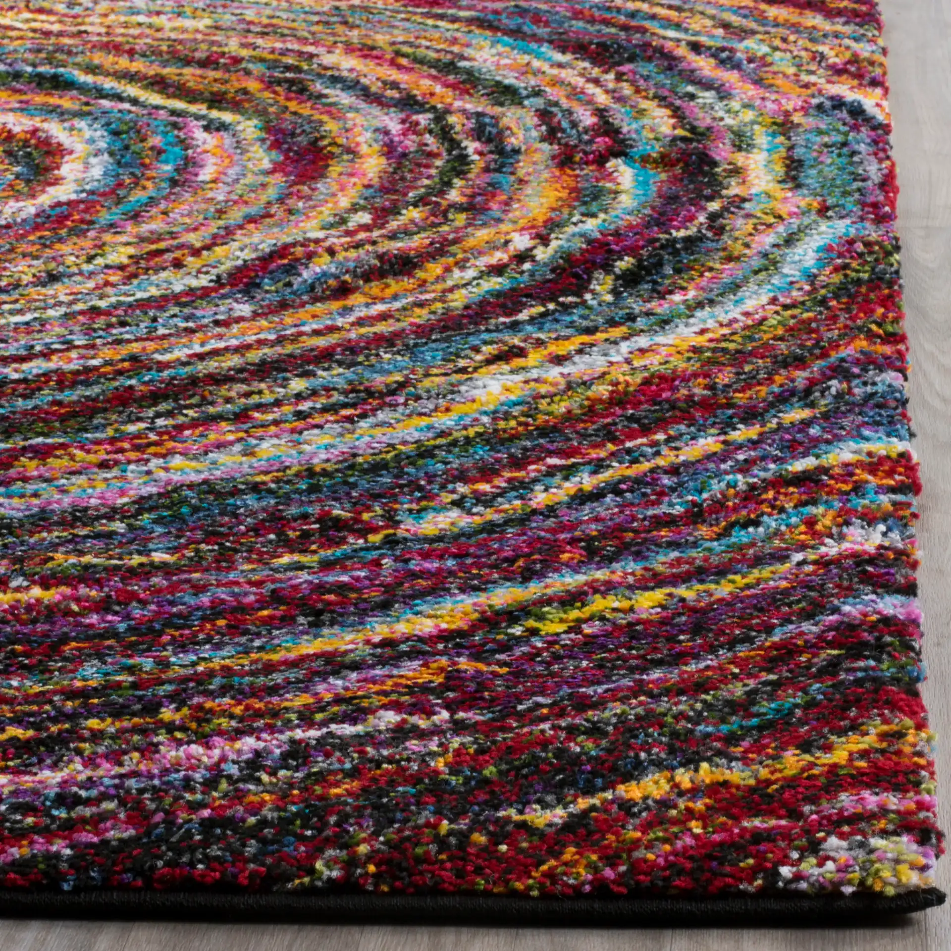 Fiesta Concentric Ripple Shag Rug in Multicolor in a styled room