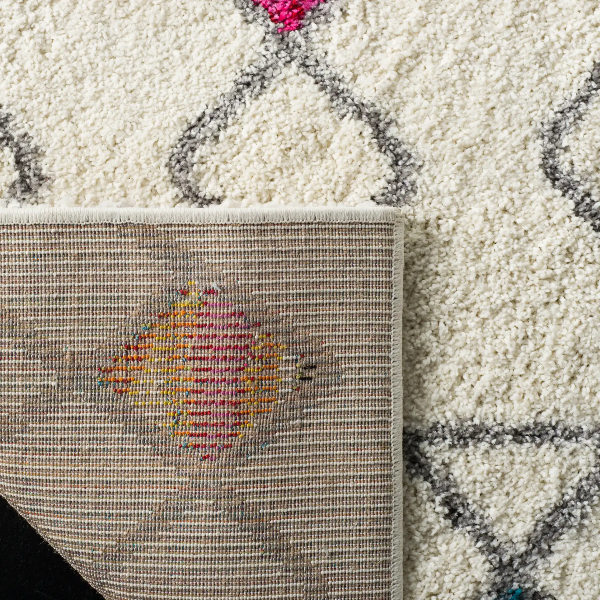 Fiesta Diamond Trellis Shag Rug in Cream / Multicolor in a styled room
