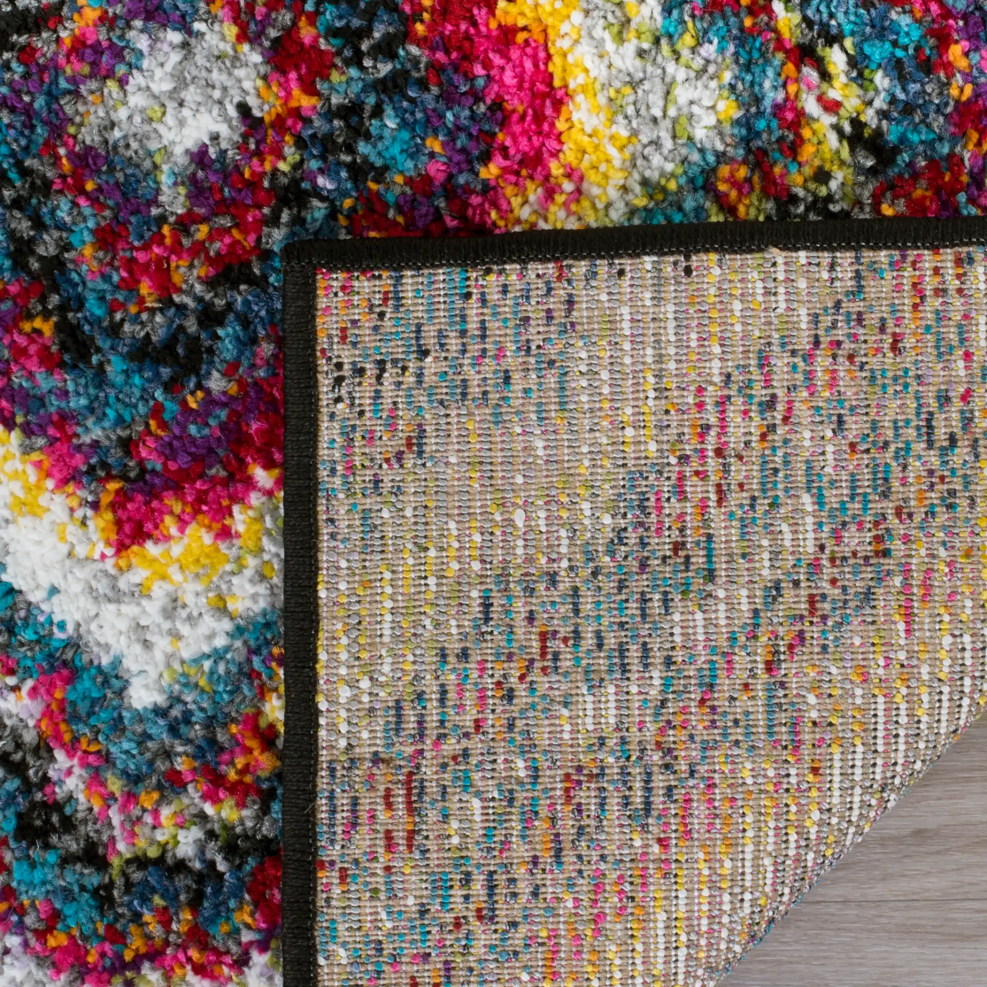 Fiesta Concentric Diamond Shag Rug in Multicolor in a styled room