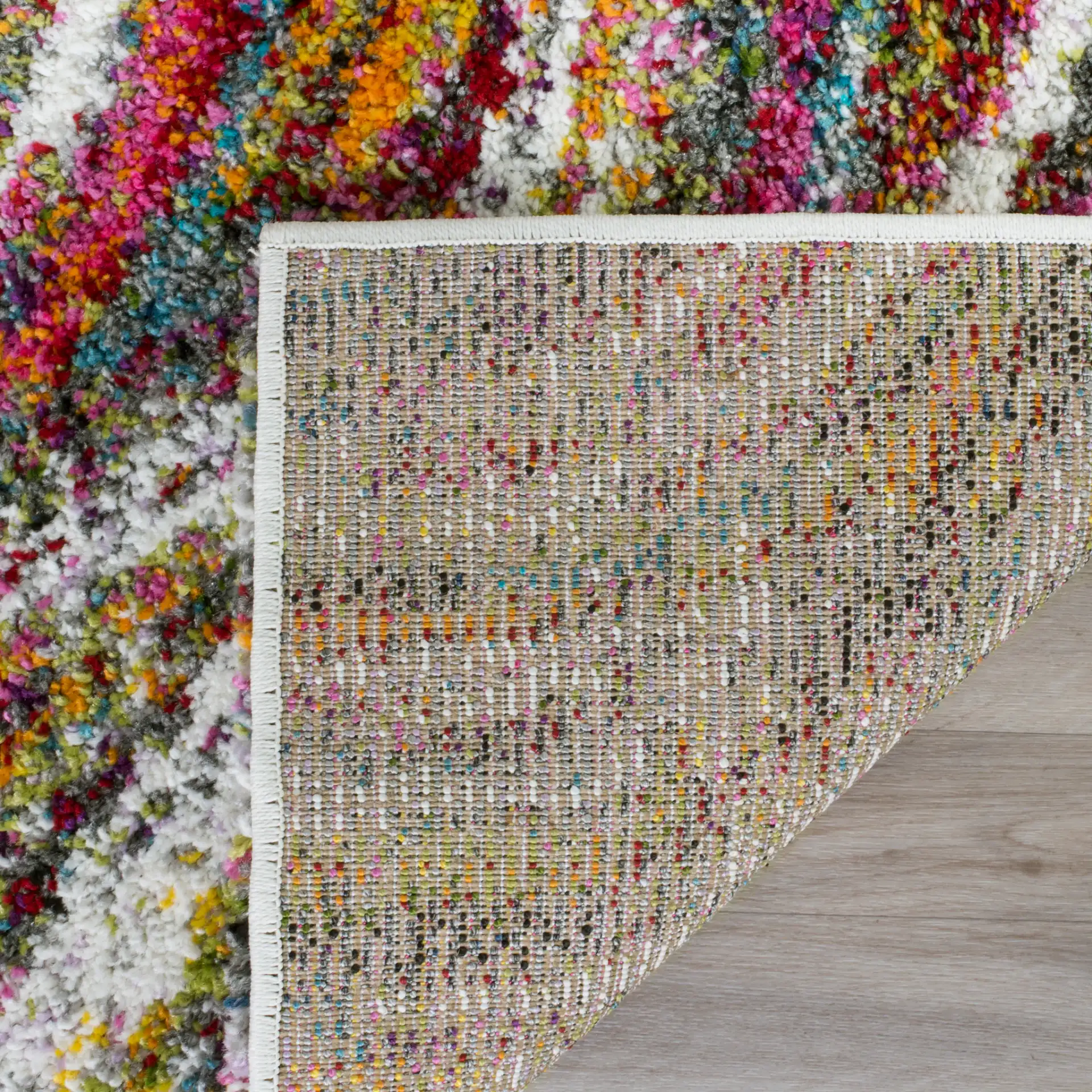 Fiesta Wave Shag Rug in Multicolor in a styled room
