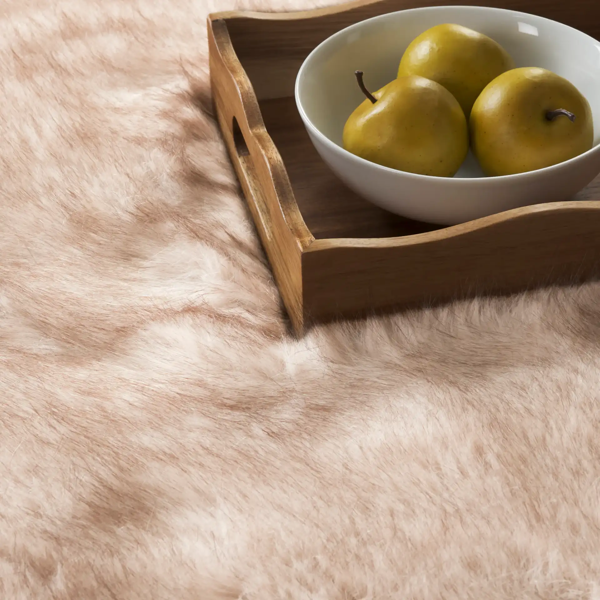 Faux Sheep Skin Solid Shag Rug in Beige / Brown in a styled room