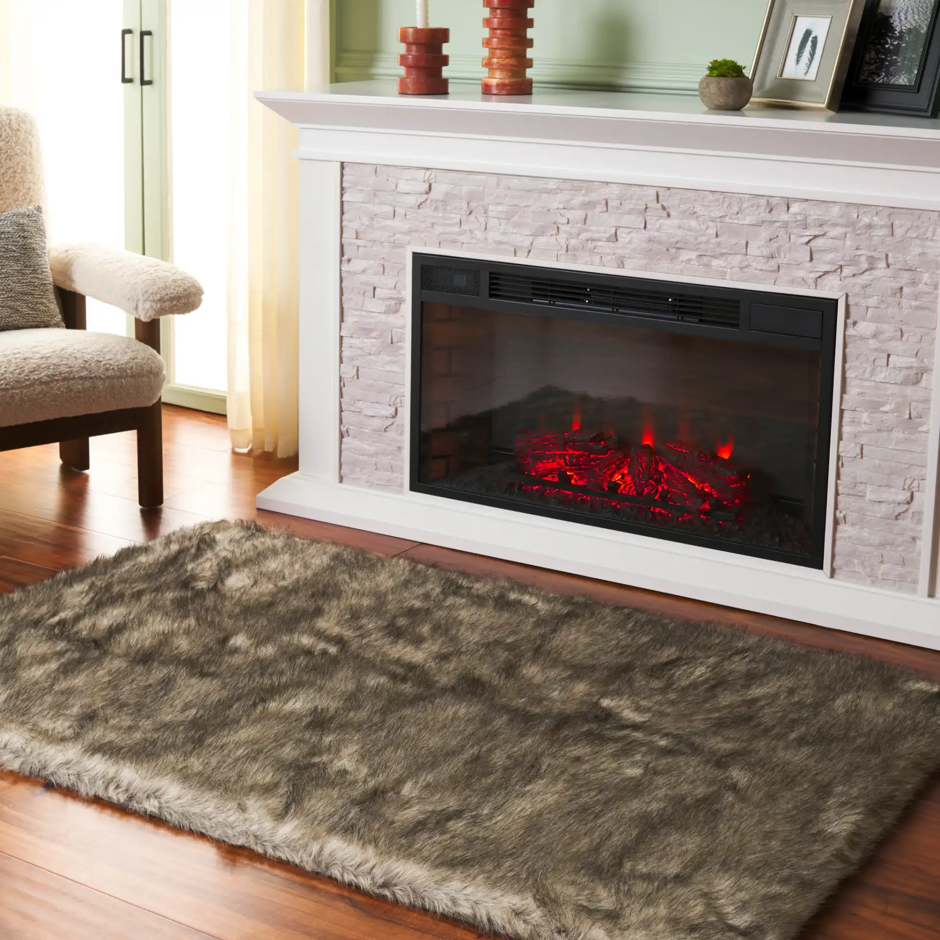 Faux Sheep Skin Solid Shag Rug in Gray / Black in a styled room