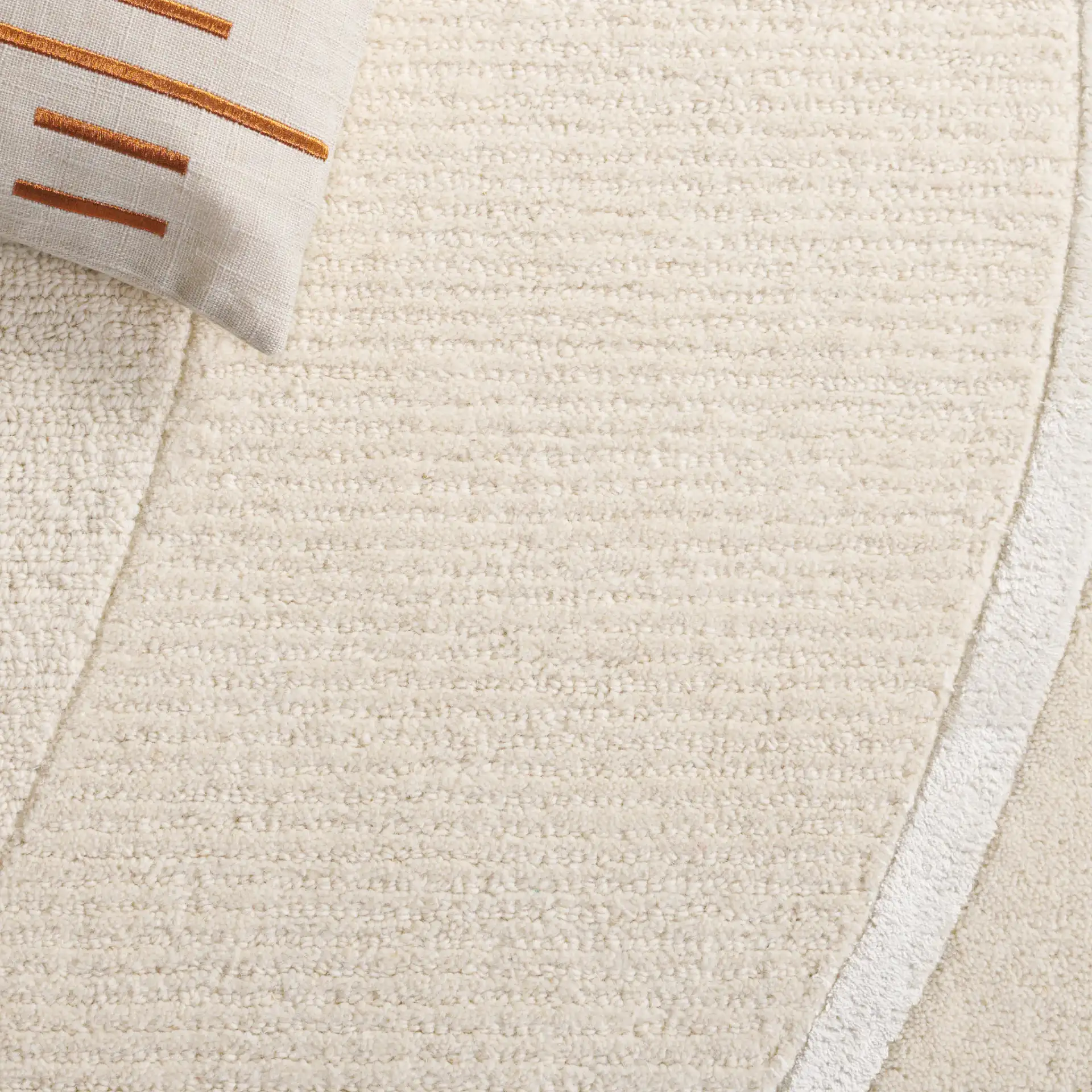 Fifth Avenue Wavy Line Hand-Tufted Rug in Ivory in a styled room