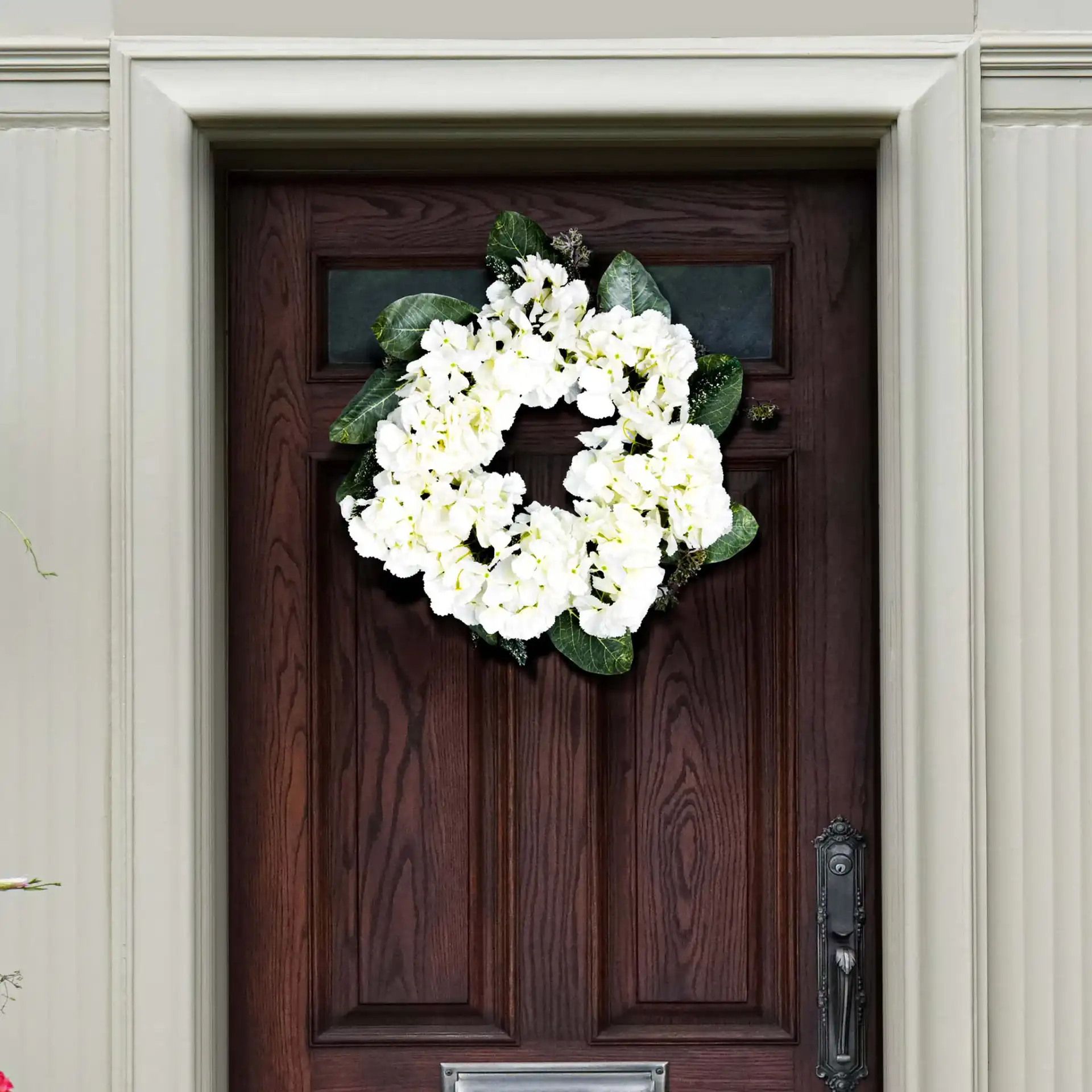 Faux 22" Hydrangea & Magnolia Wreath in White / Green in a styled room