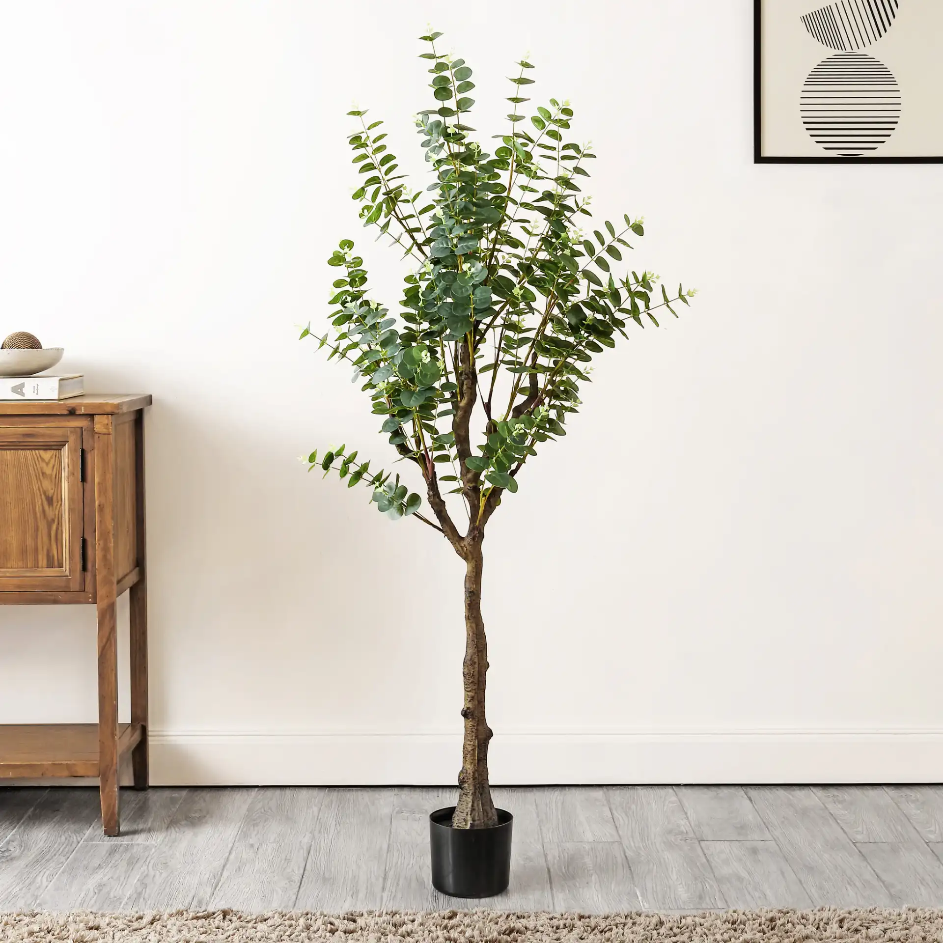 Faux 60"Potted Eucalyptus Tree in Green in a styled room