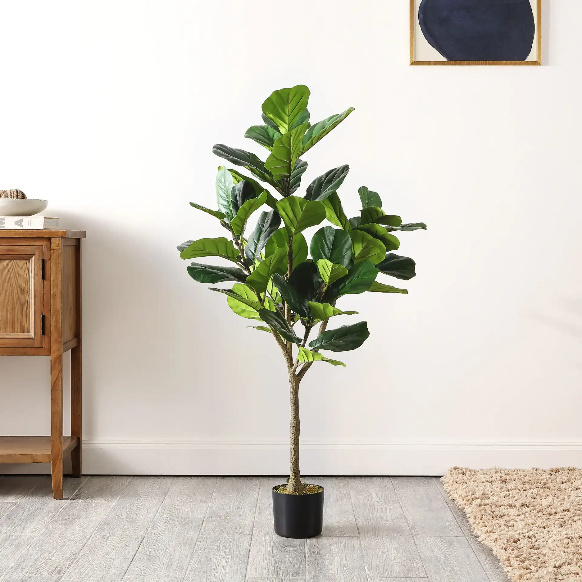 Faux 50" Potted Fig Tree in Green in a styled room