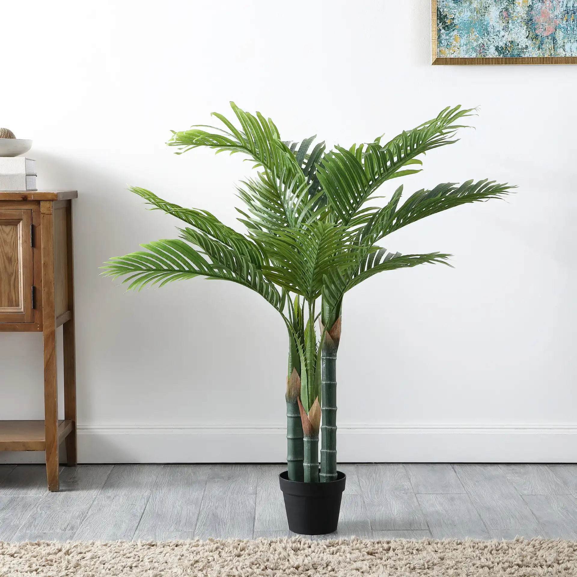 Faux 49" Potted Palm Tree in Green in a styled room