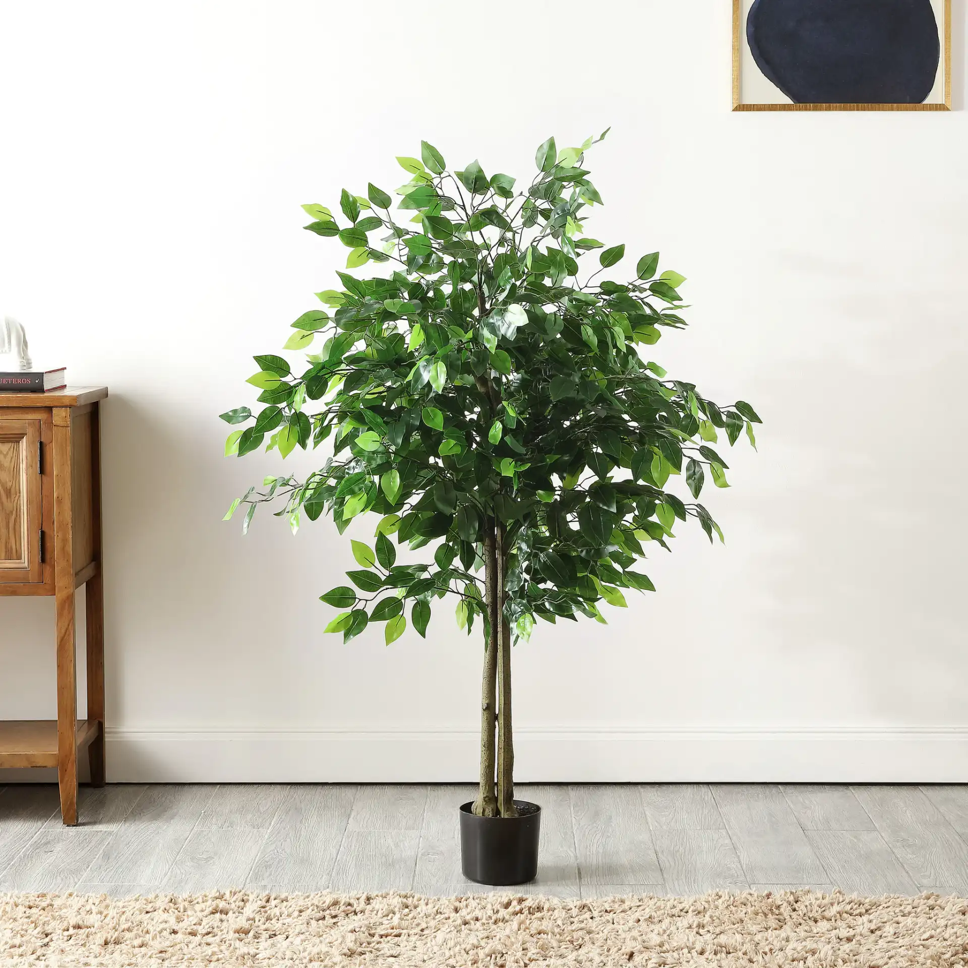 Faux 55" Potted Bushficus Tree in Green in a styled room