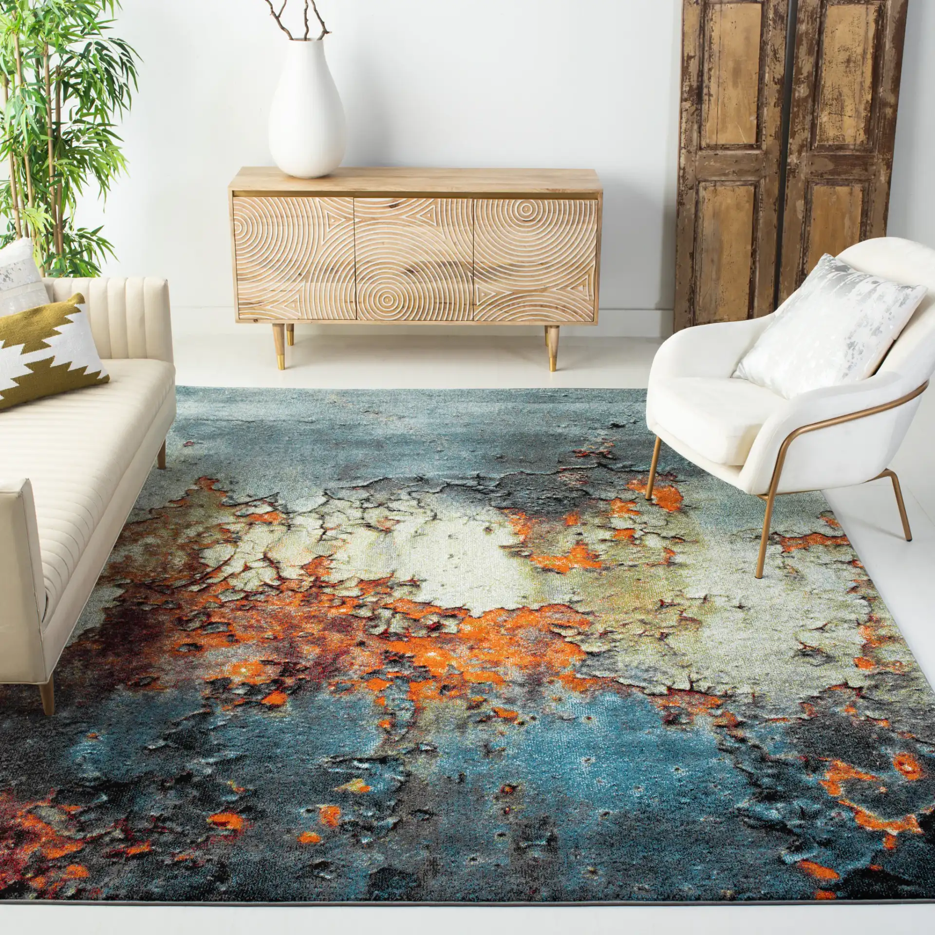 Glacier Abstract Rug in Blue / Multicolor in a styled room