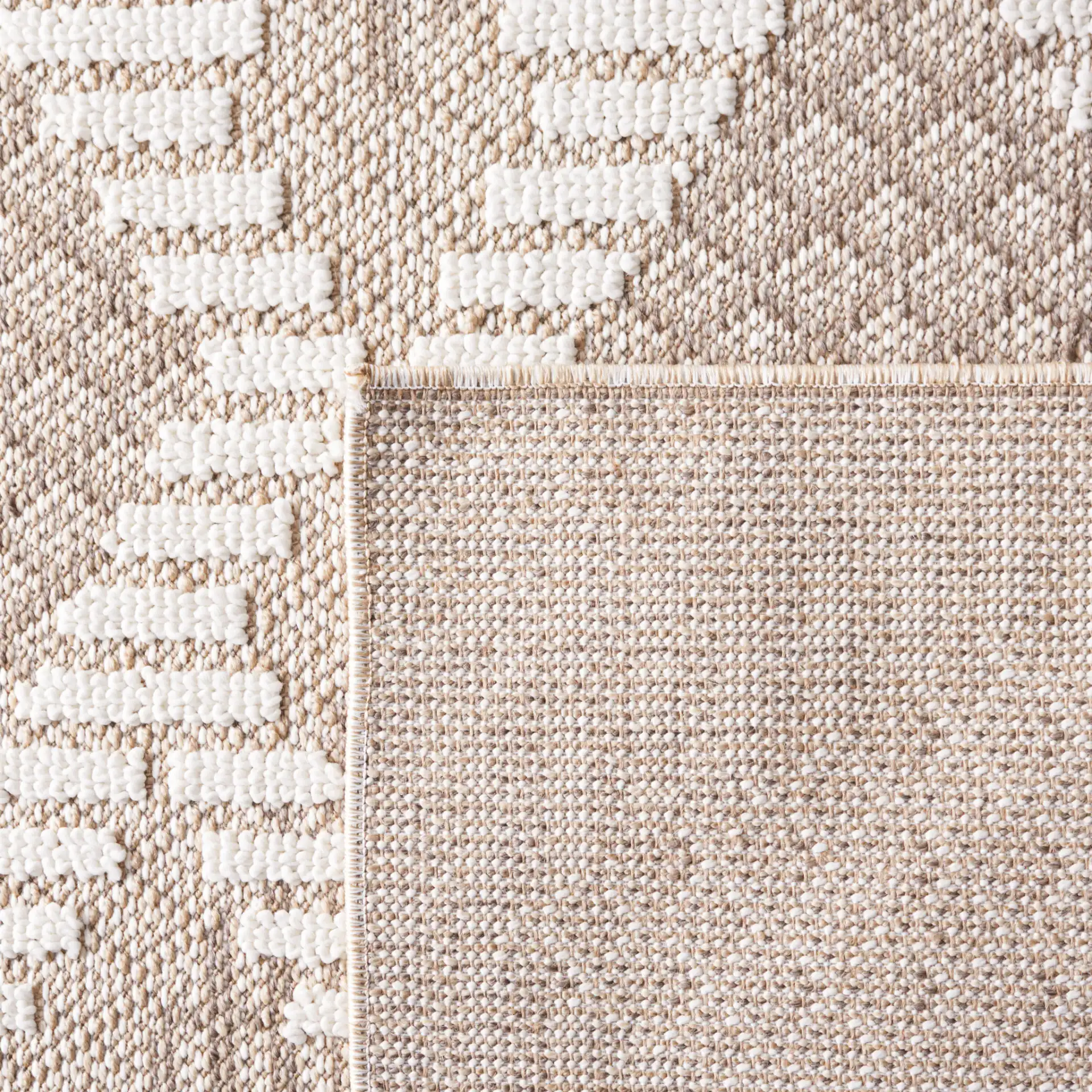 Global Diamond Grid Rug in Beige / Ivory in a styled room