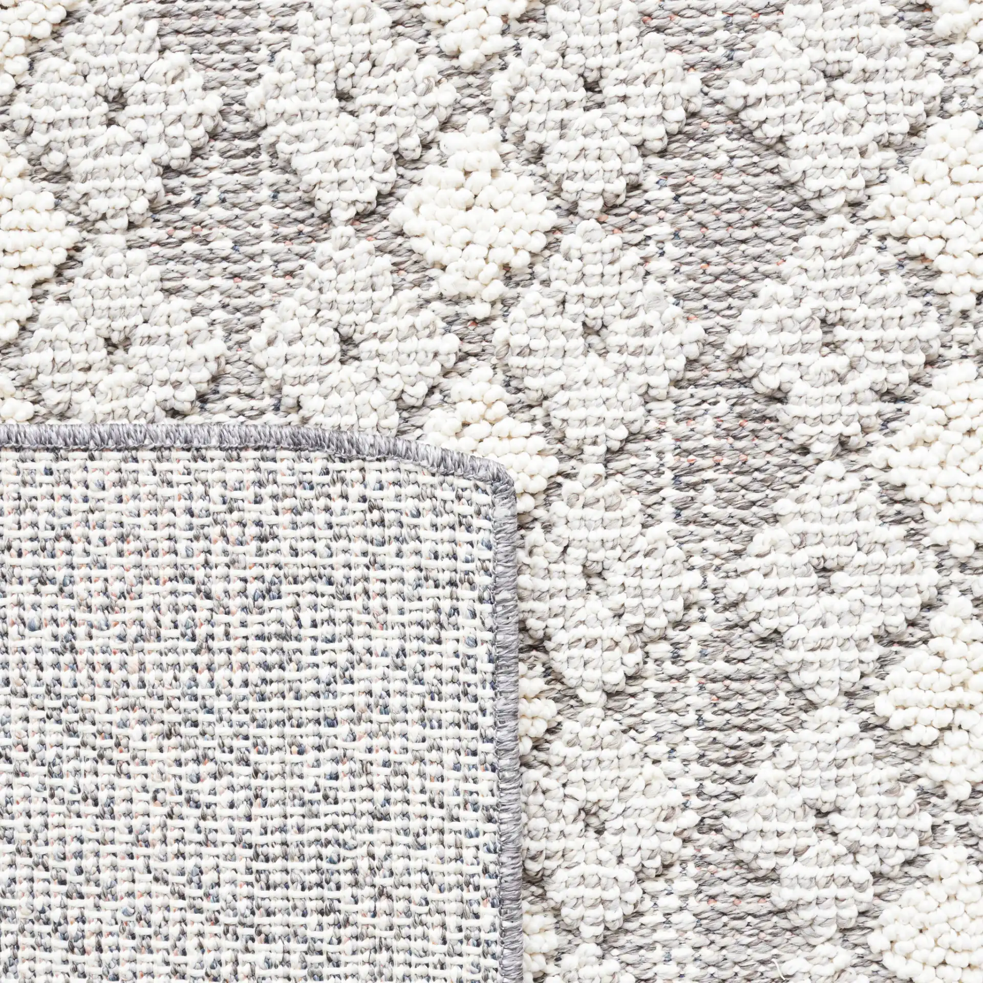 Global Bordered Diamond Rug in Light Gray / Dark Gray in a styled room