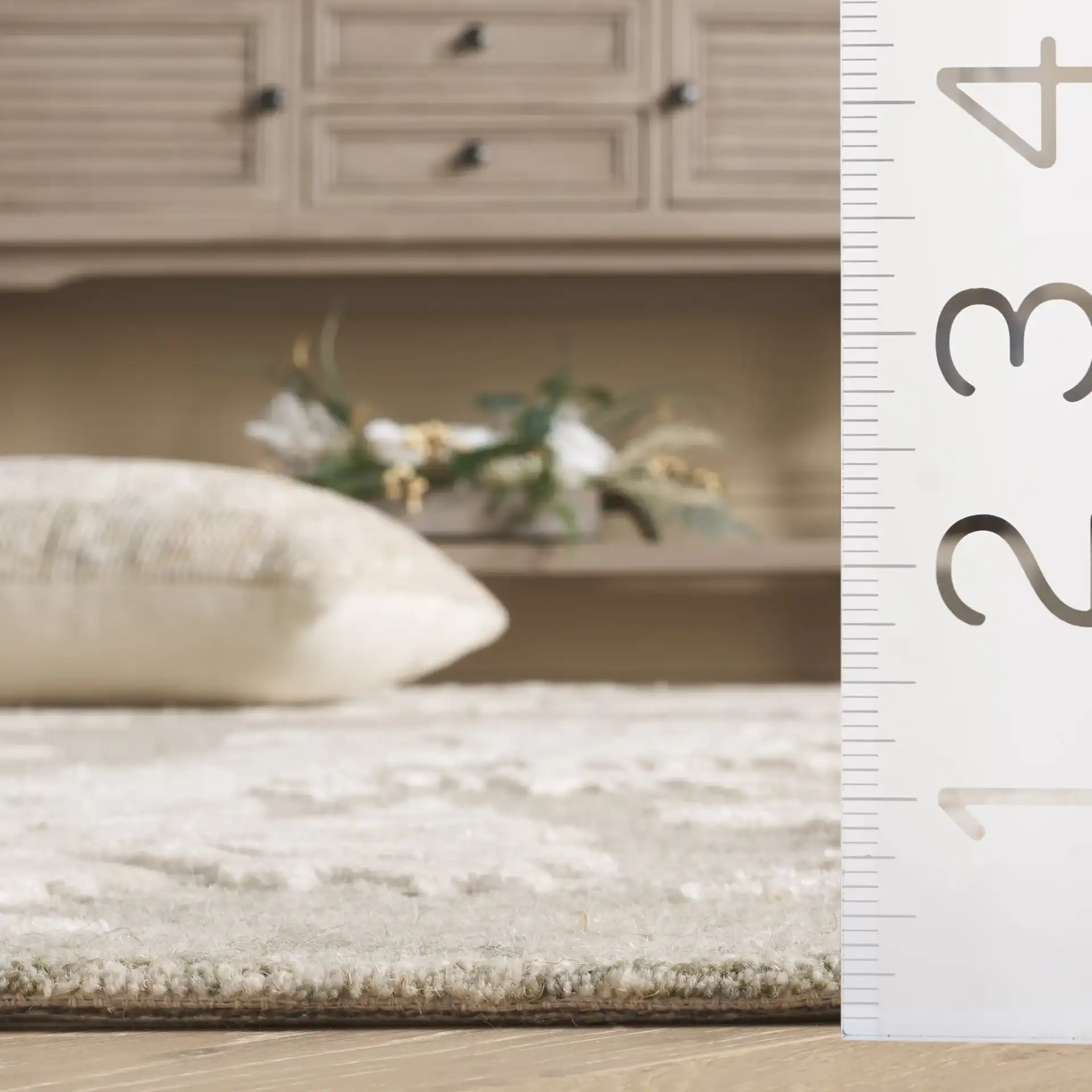Glamour Trailing Floral Hand-Tufted Rug in Green / Ivory in a styled room