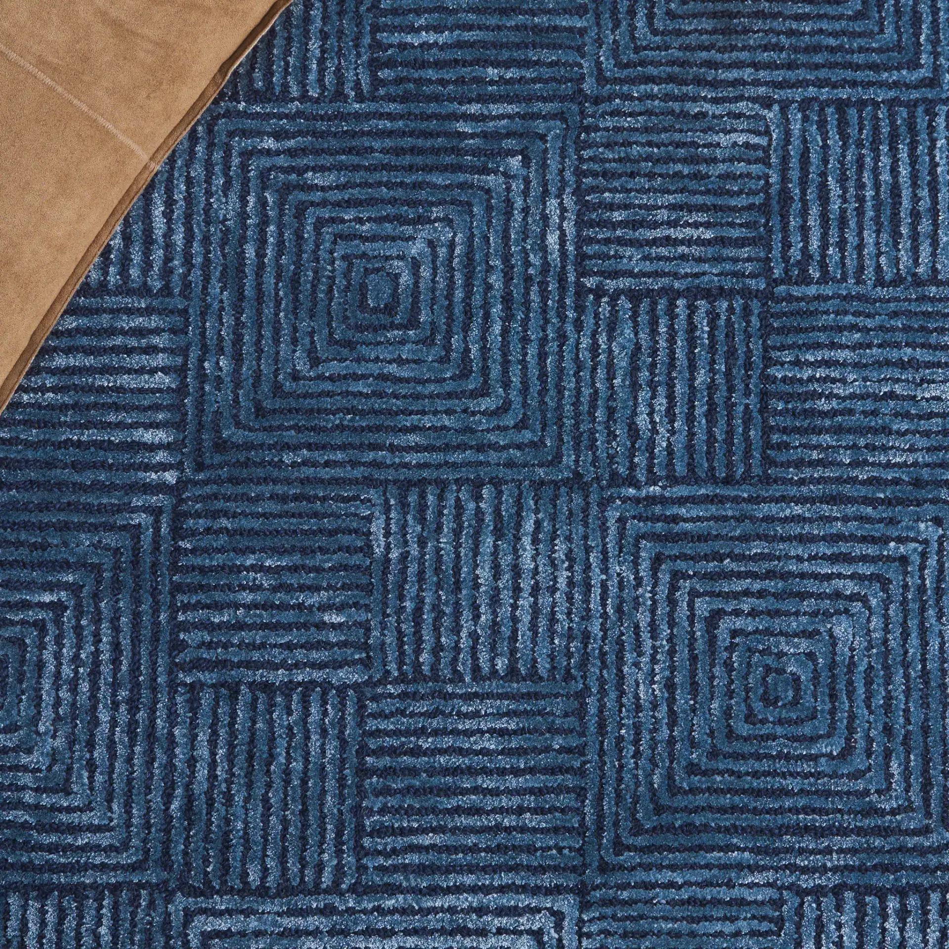 Glamour Concentric Squares Hand-Tufted Rug in Navy in a styled room