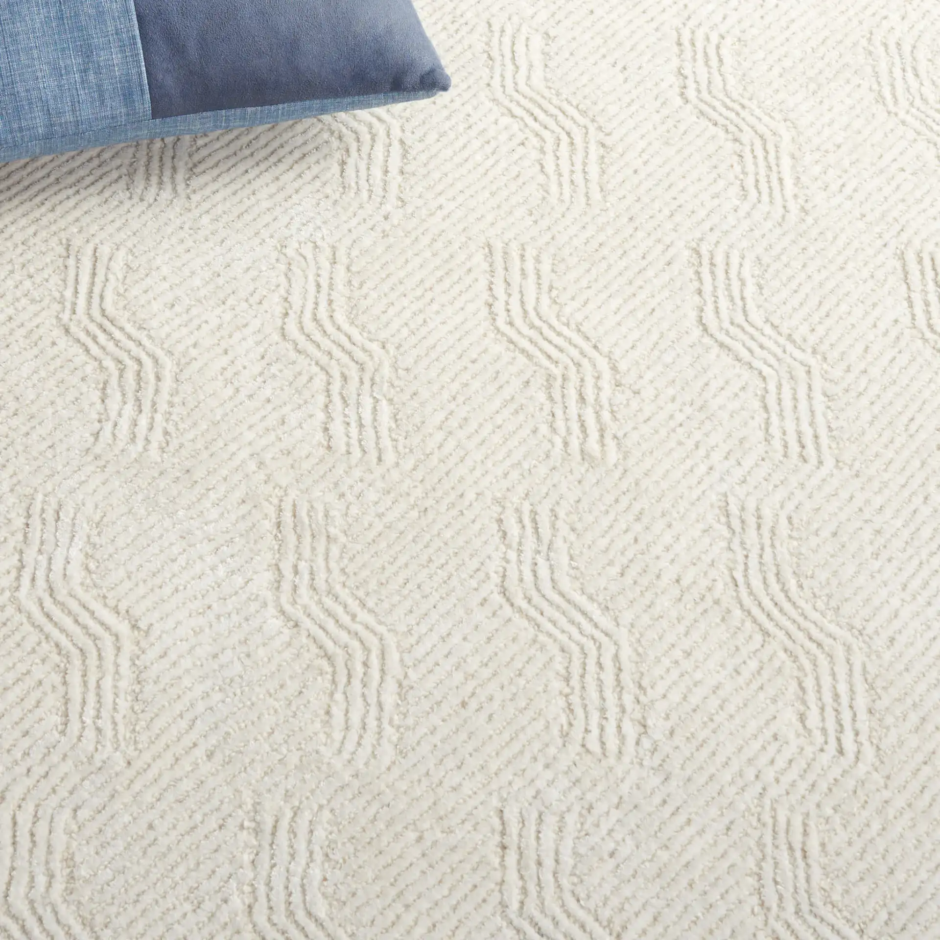 Glamour Wavy Stripe Hand-Tufted Rug in Ivory in a styled room