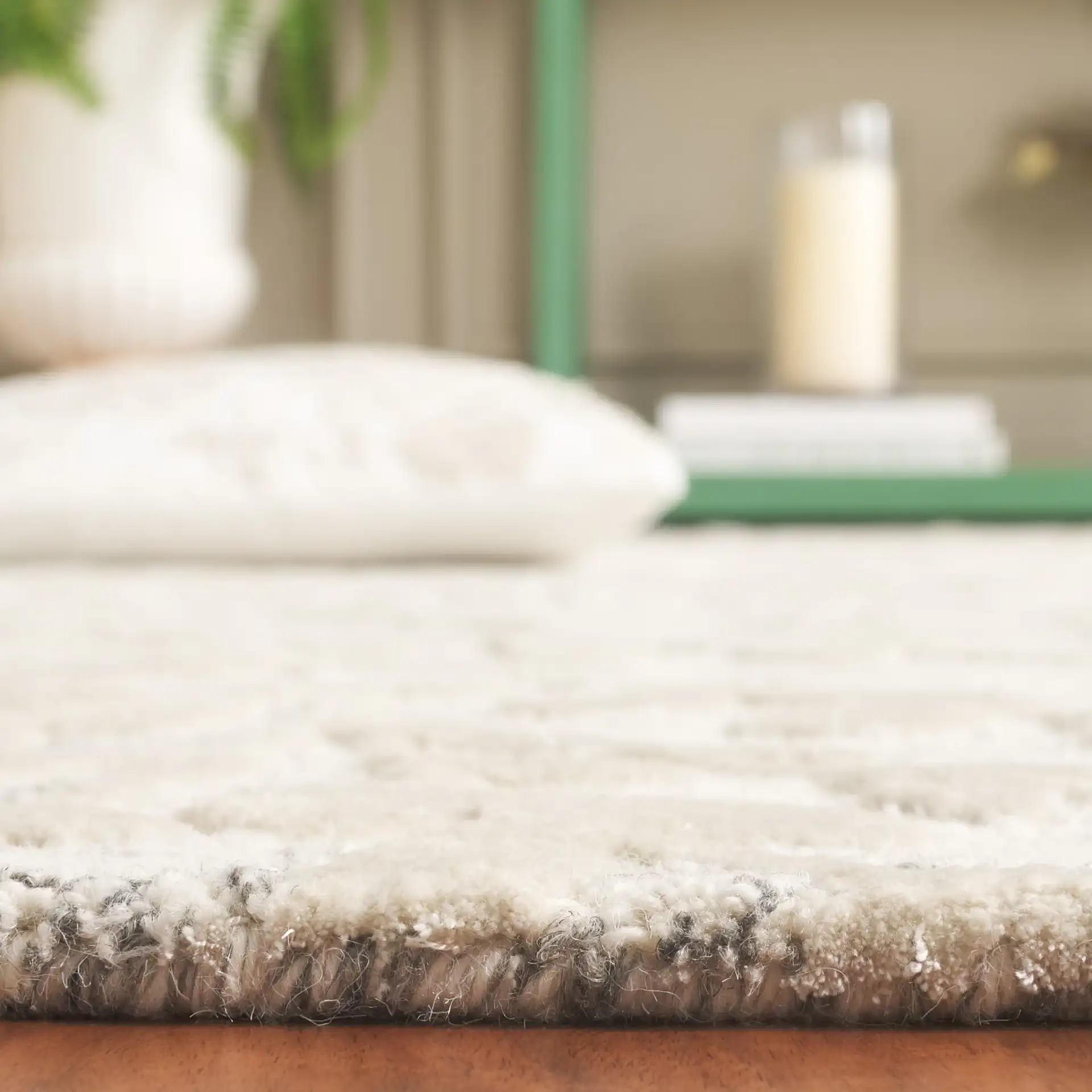 Glamour Eucalyptus Vine Hand-Tufted Rug in Natural / Gray in a styled room