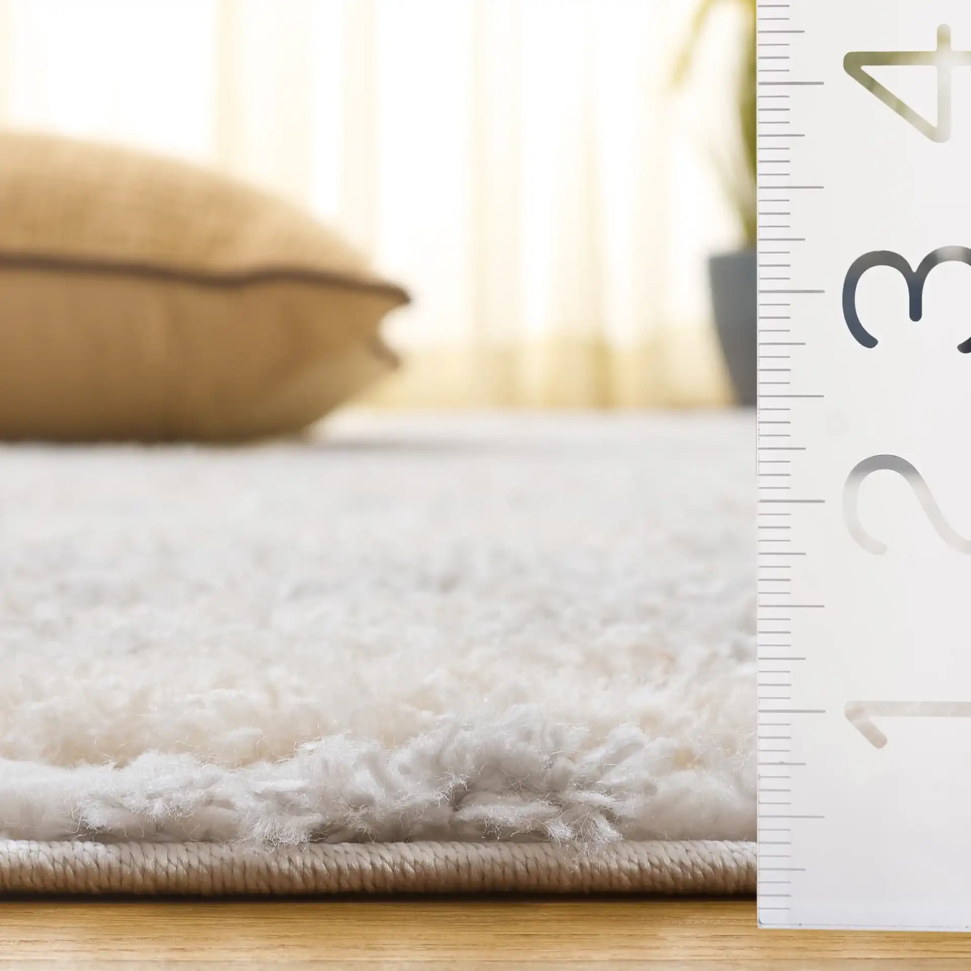 Gemma Milan Abstract Shag Rug in Ivory / Beige Gray in a styled room