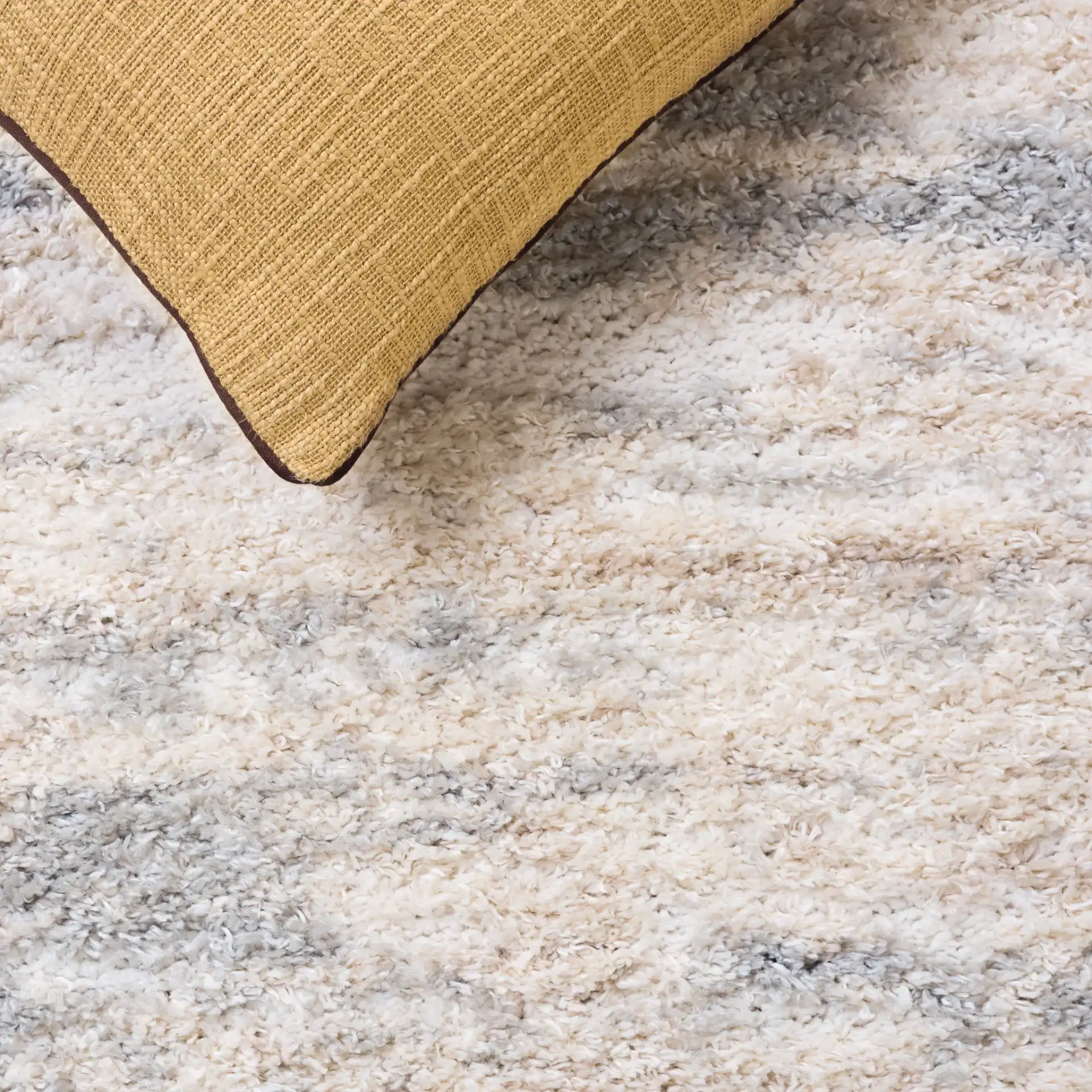Gemma Milan Abstract Shag Rug in Ivory / Beige Gray in a styled room