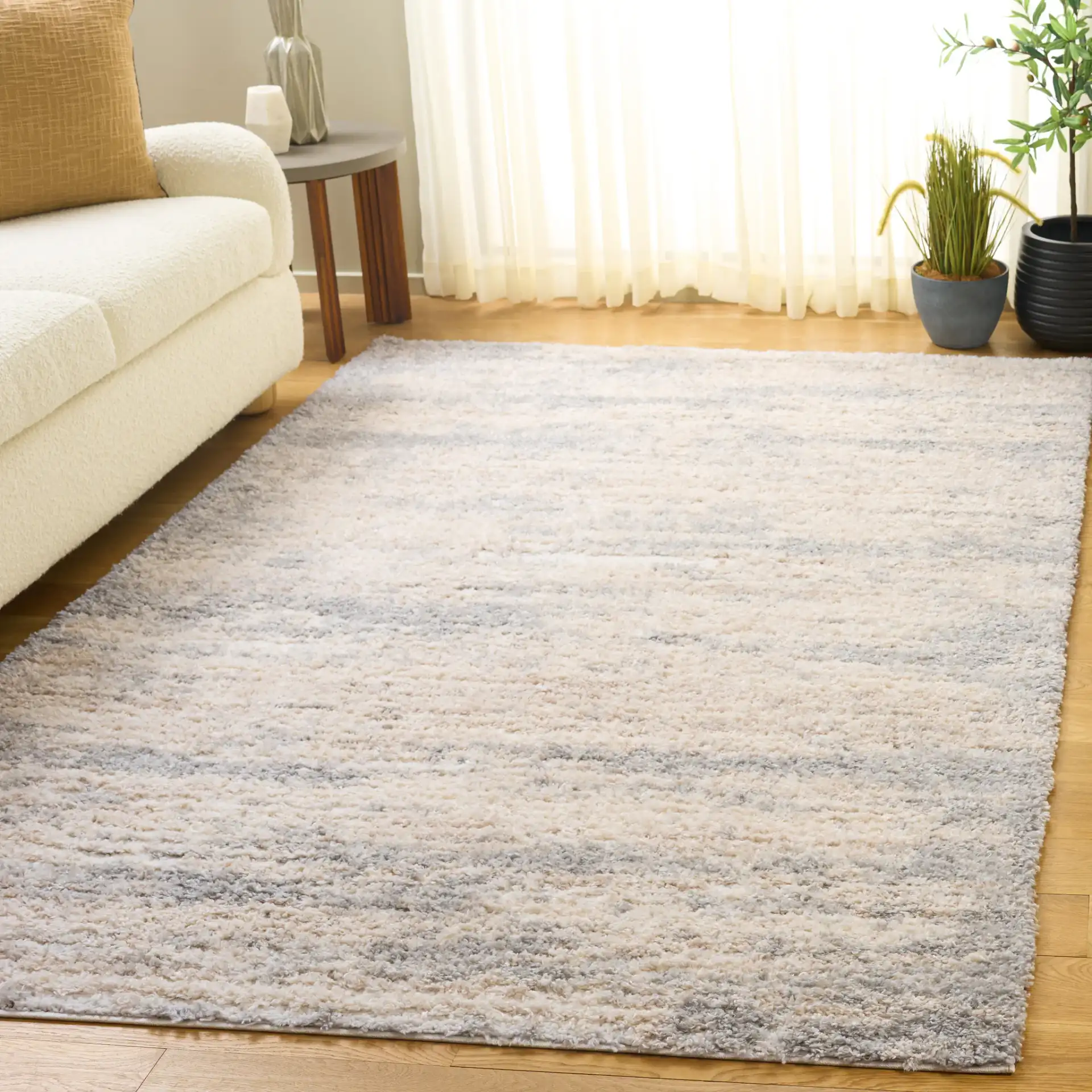 Gemma Milan Abstract Shag Rug in Ivory / Beige Gray in a styled room