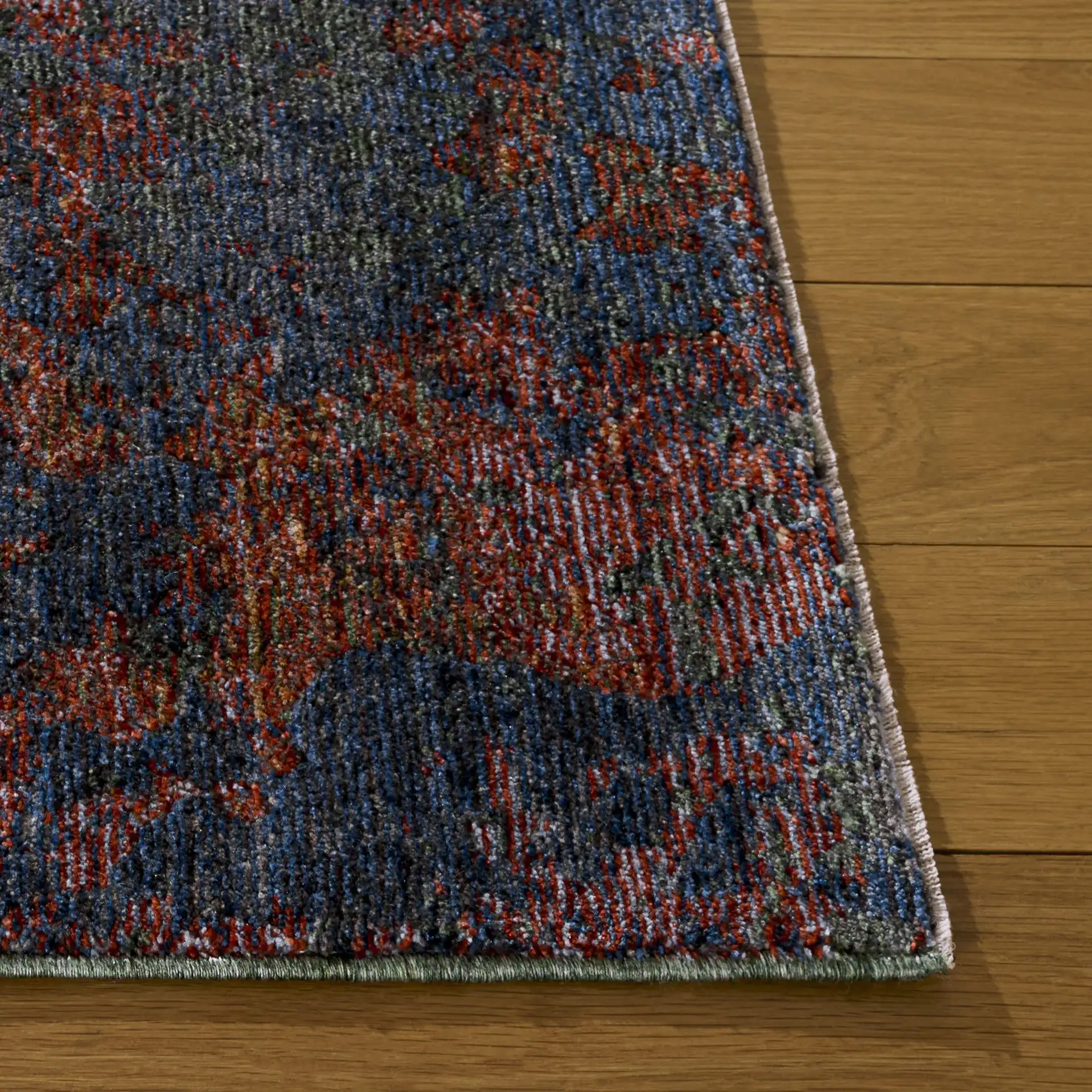 Gemstone Modern Abstract Rug in Rust Sage / Navy in a styled room