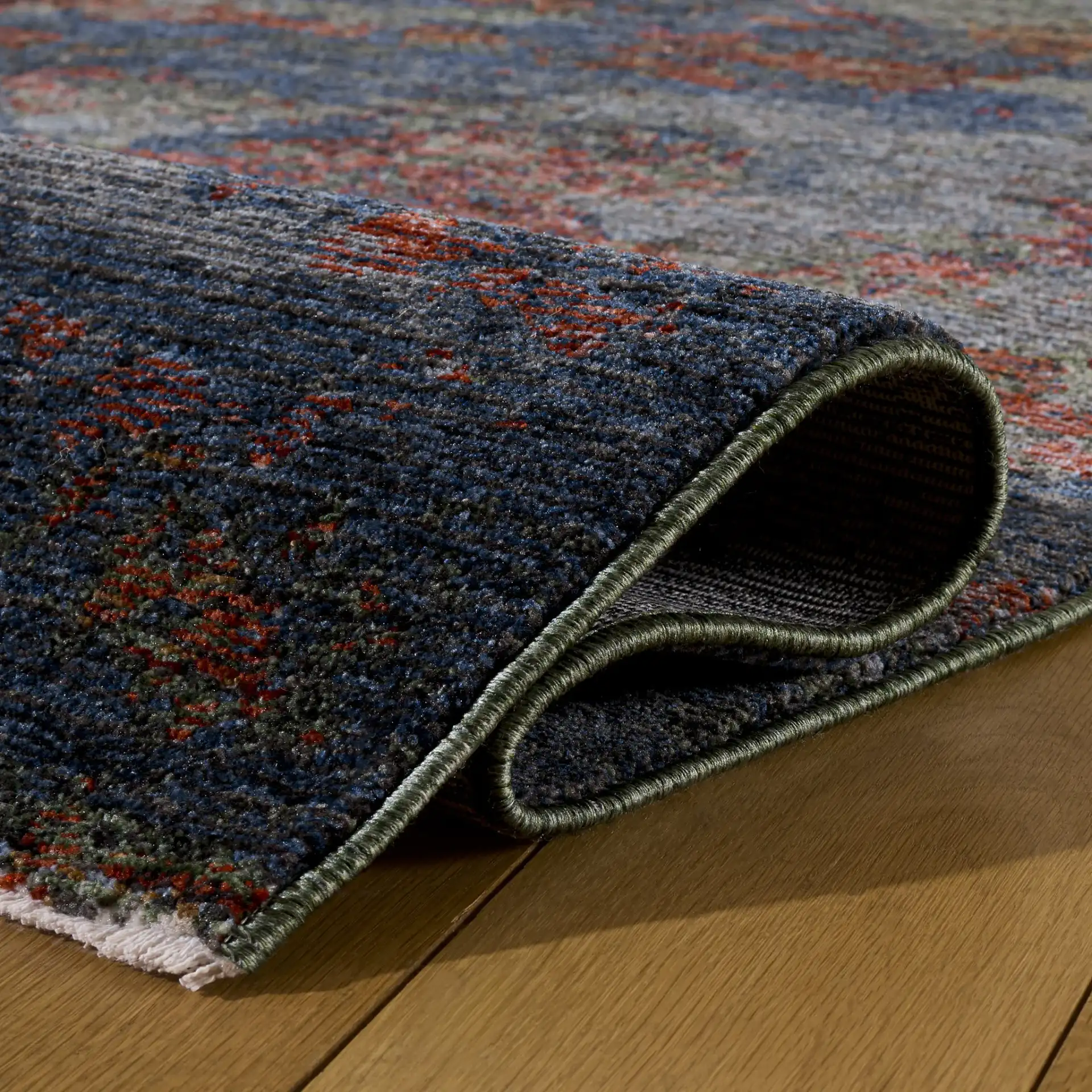 Gemstone Modern Abstract Rug in Rust Sage / Navy in a styled room
