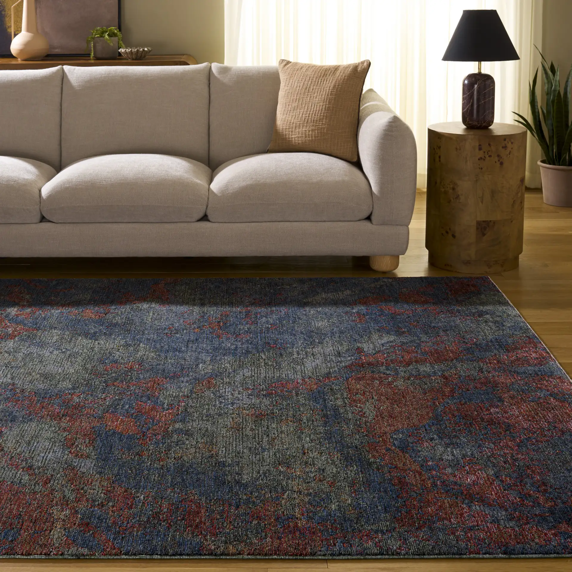 Gemstone Modern Abstract Rug in Rust Sage / Navy in a styled room