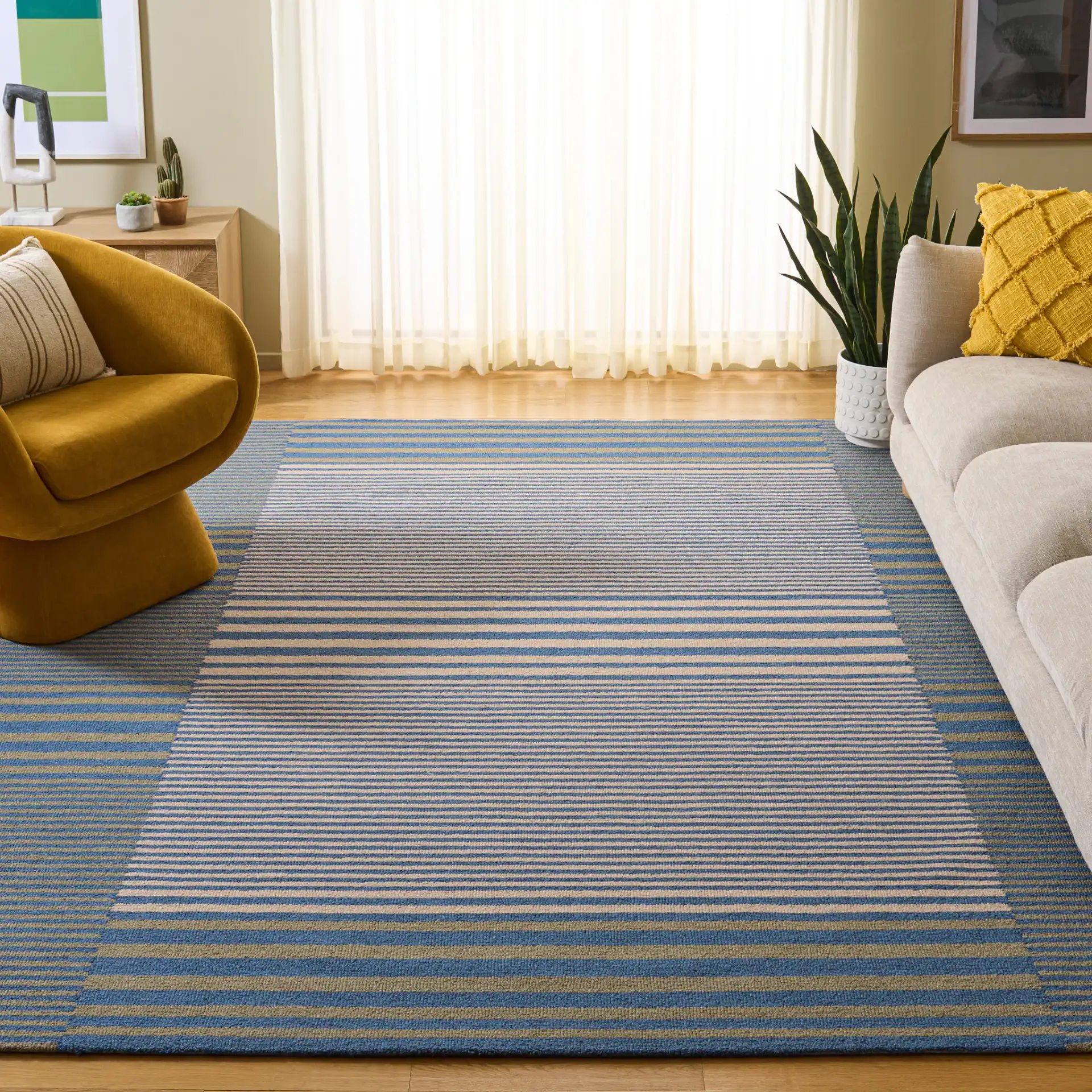 Genre Blocked Stripe Hand-Tufted Wool Rug in Blue / Ivory in a styled room