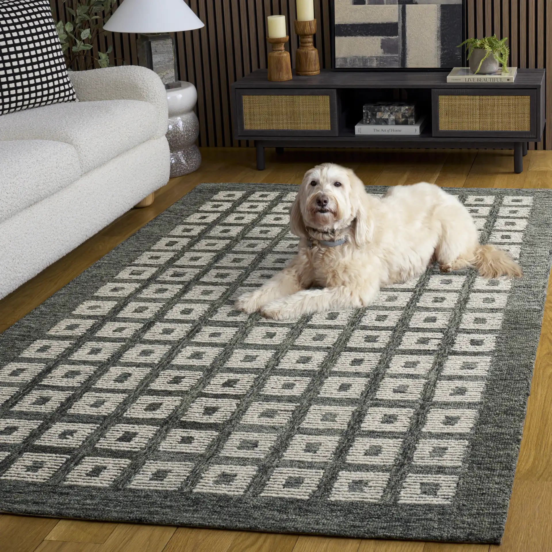 Genre Modern Grid Hand-Tufted Wool Rug in Green / Ivory in a styled room