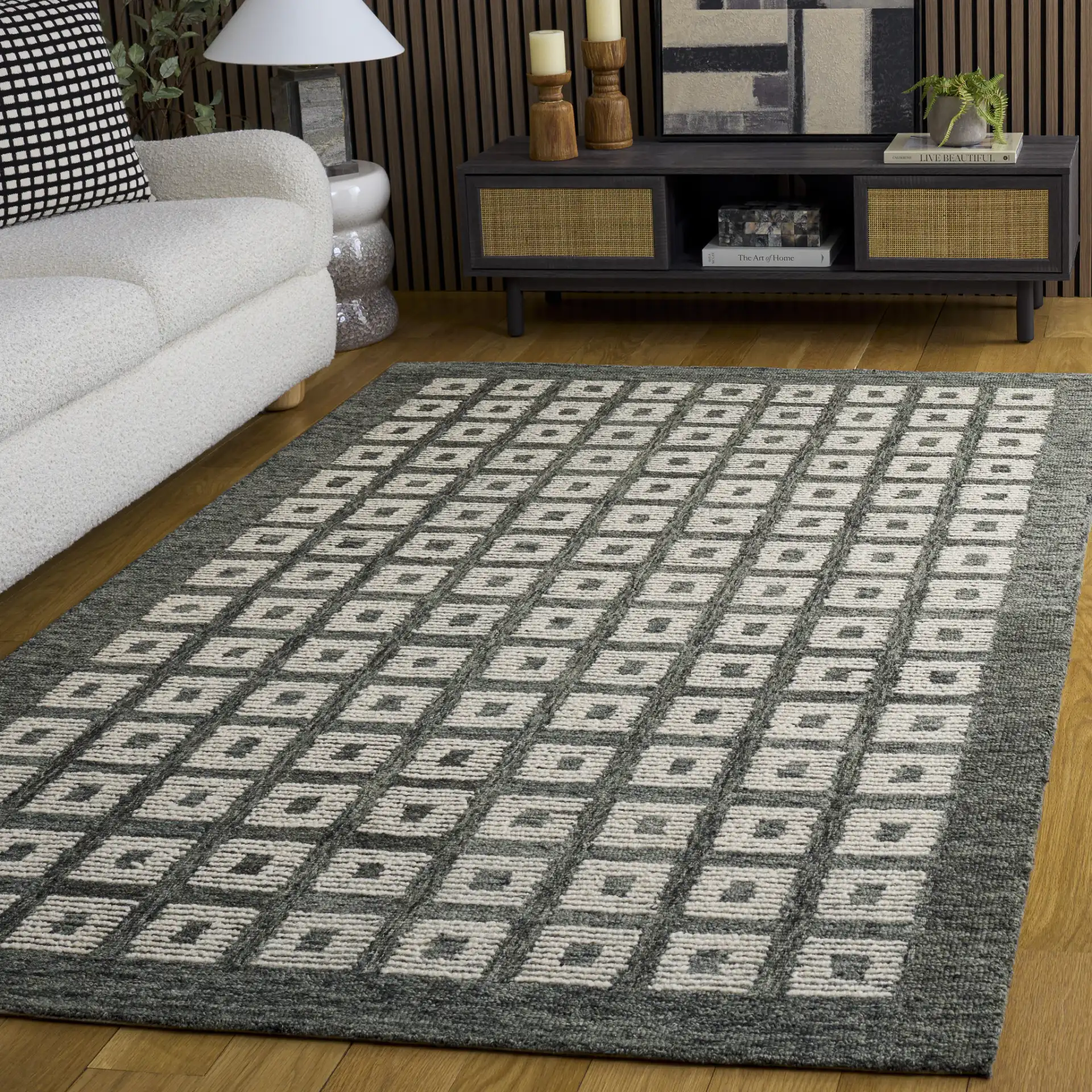 Genre Modern Grid Hand-Tufted Wool Rug in Green / Ivory in a styled room