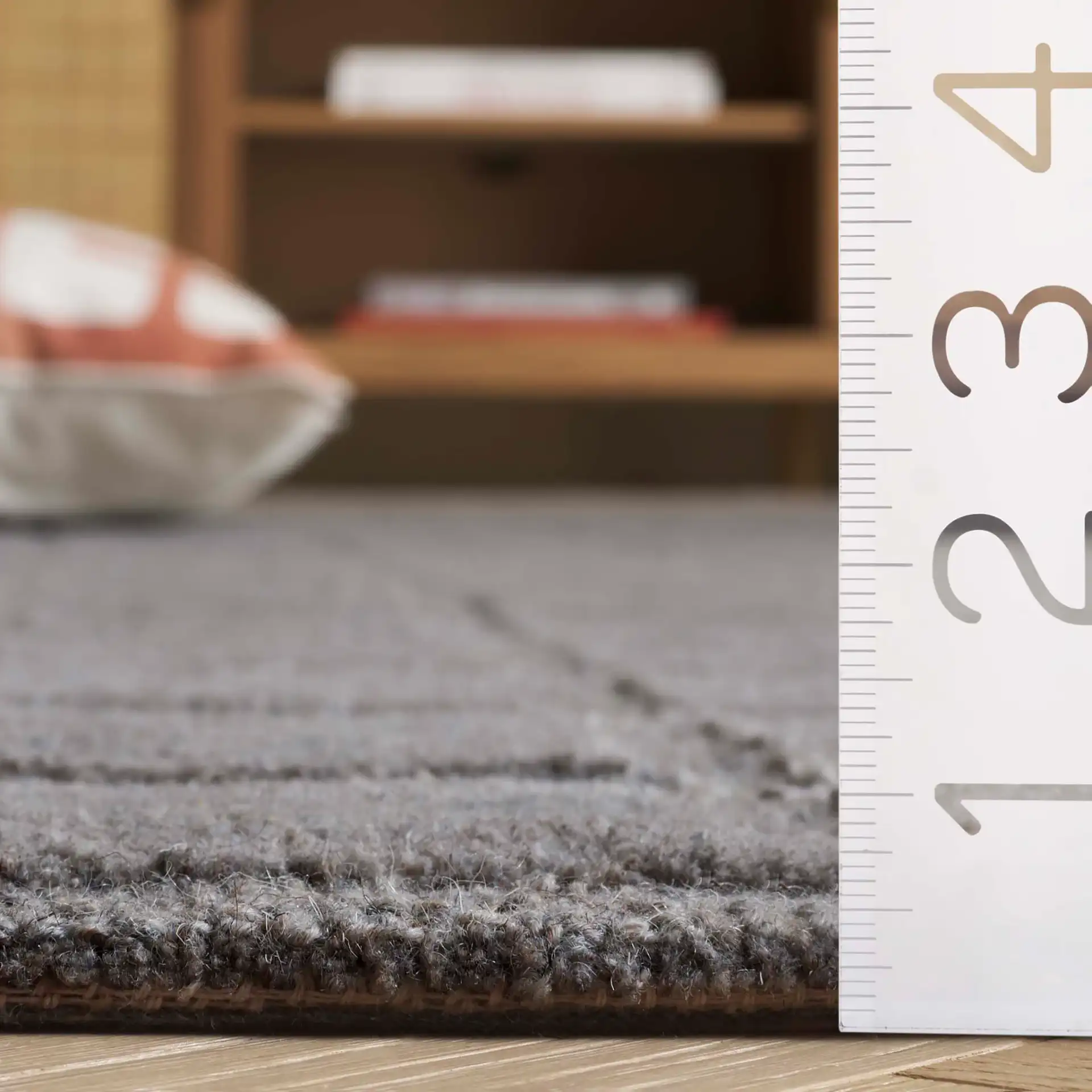 Genre Carved Grid Hand-Tufted Wool Rug in Gray in a styled room