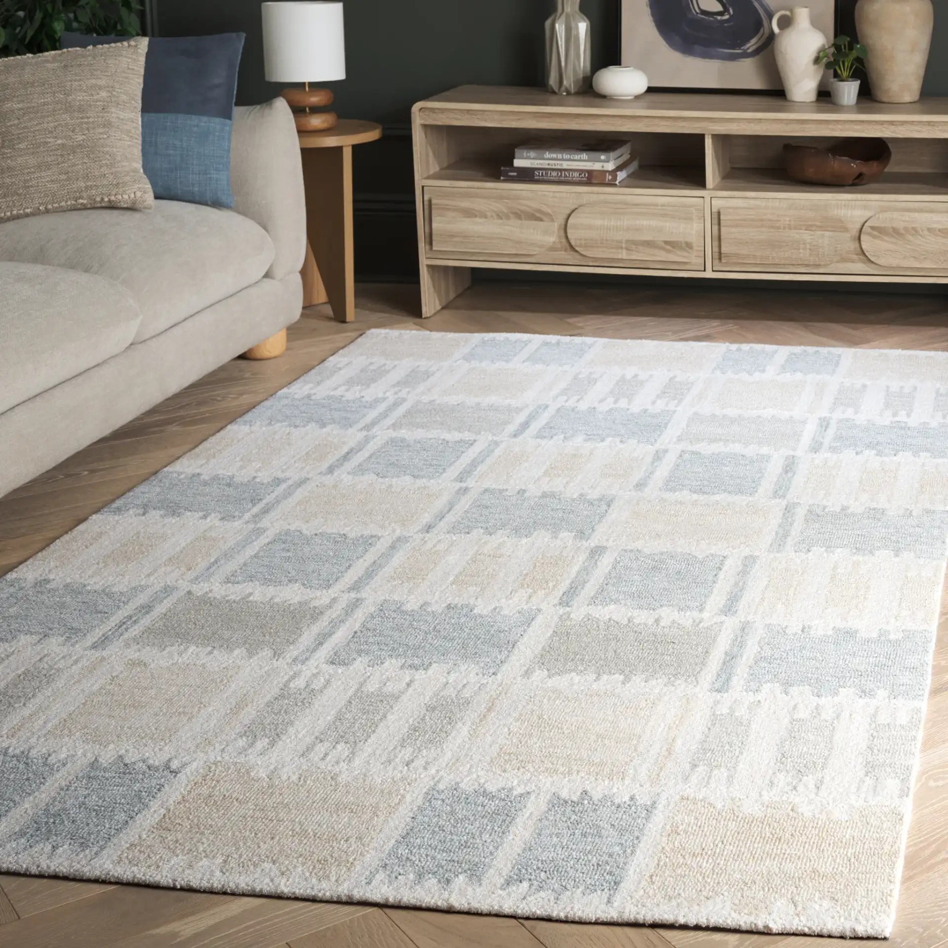 Genre Checkered Block Hand-Tufted Wool Rug in Beige / Gray in a styled room