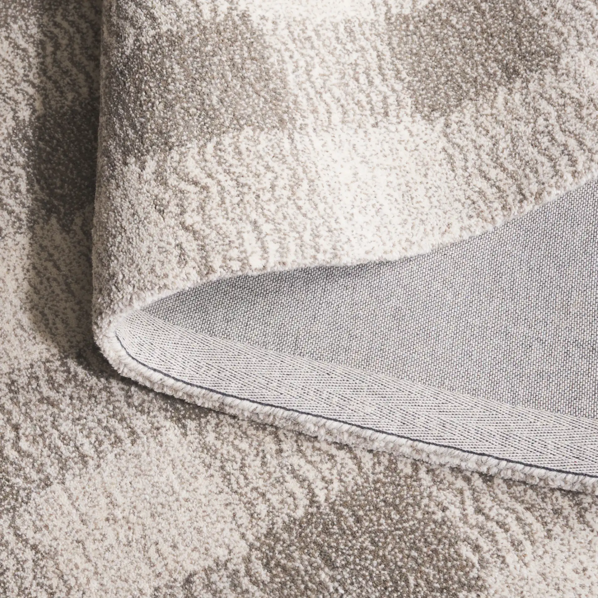 Genre Checkered Hand-Tufted Wool Rug in Gray / Ivory in a styled room