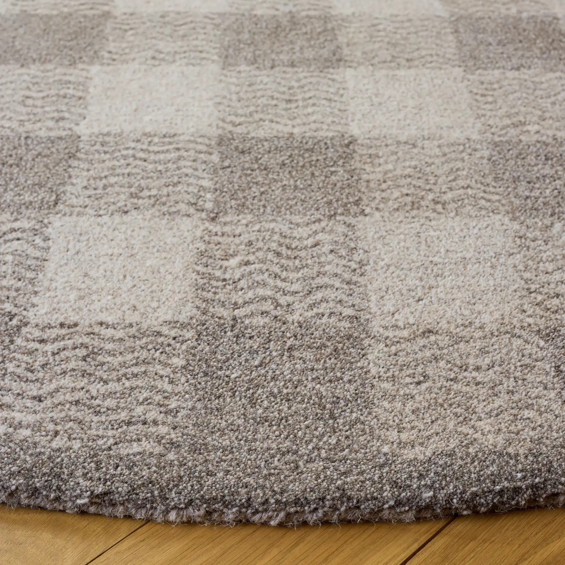 Genre Checkered Hand-Tufted Wool Rug in Gray / Ivory in a styled room