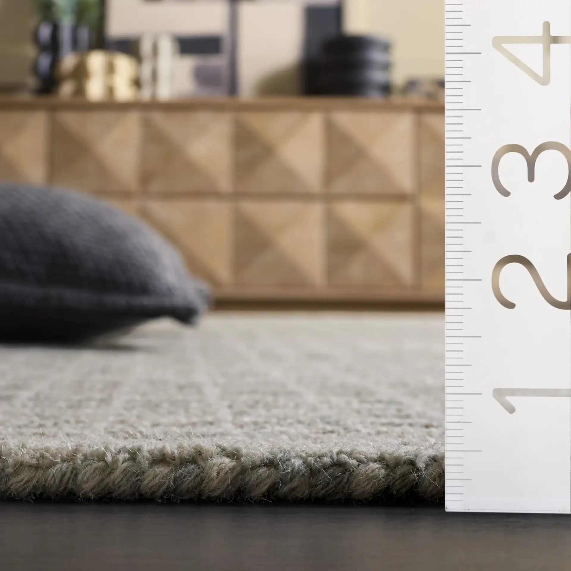 Genre Modern Grid Hand-Tufted Wool Rug in Sage / Ivory in a styled room