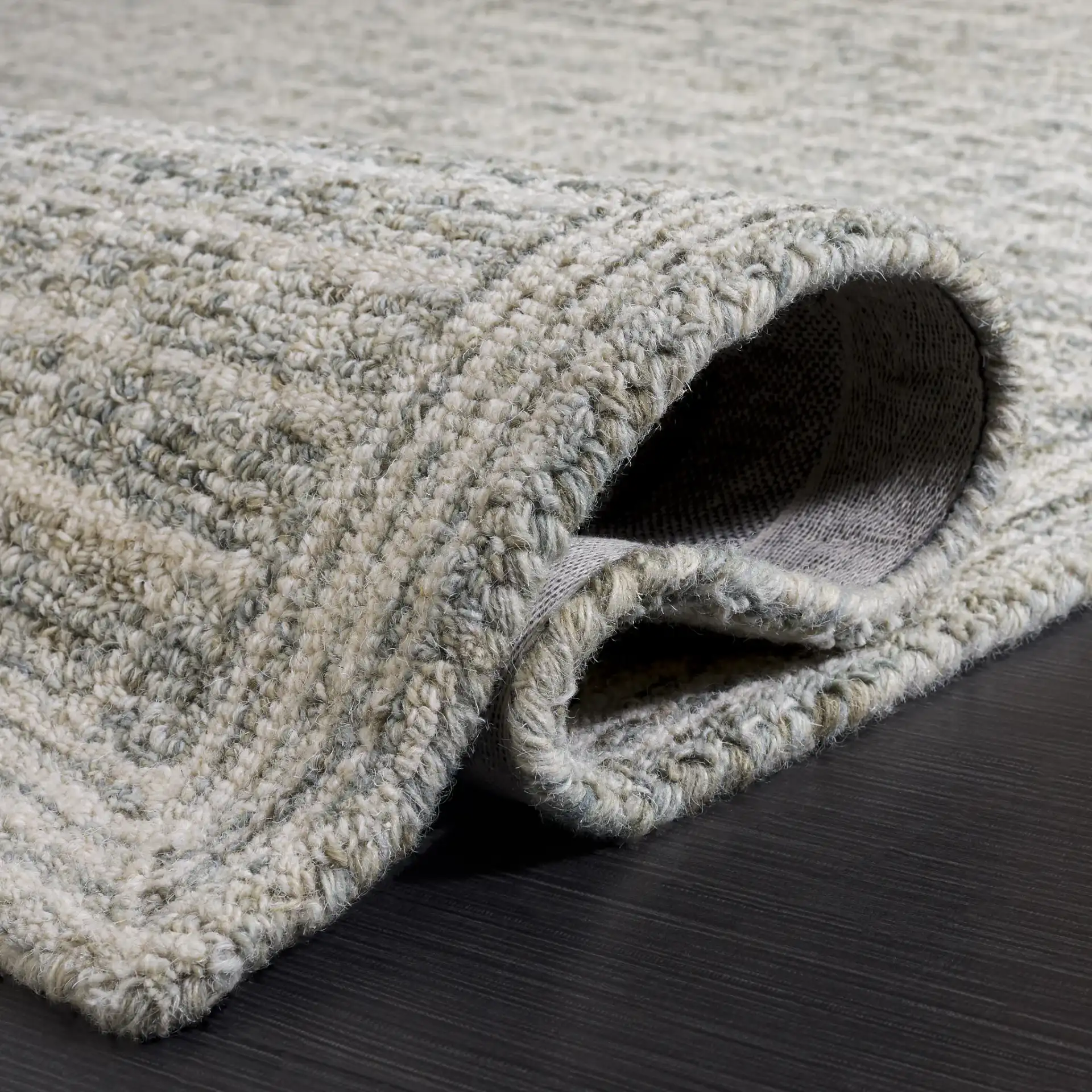Genre Modern Grid Hand-Tufted Wool Rug in Sage / Ivory in a styled room