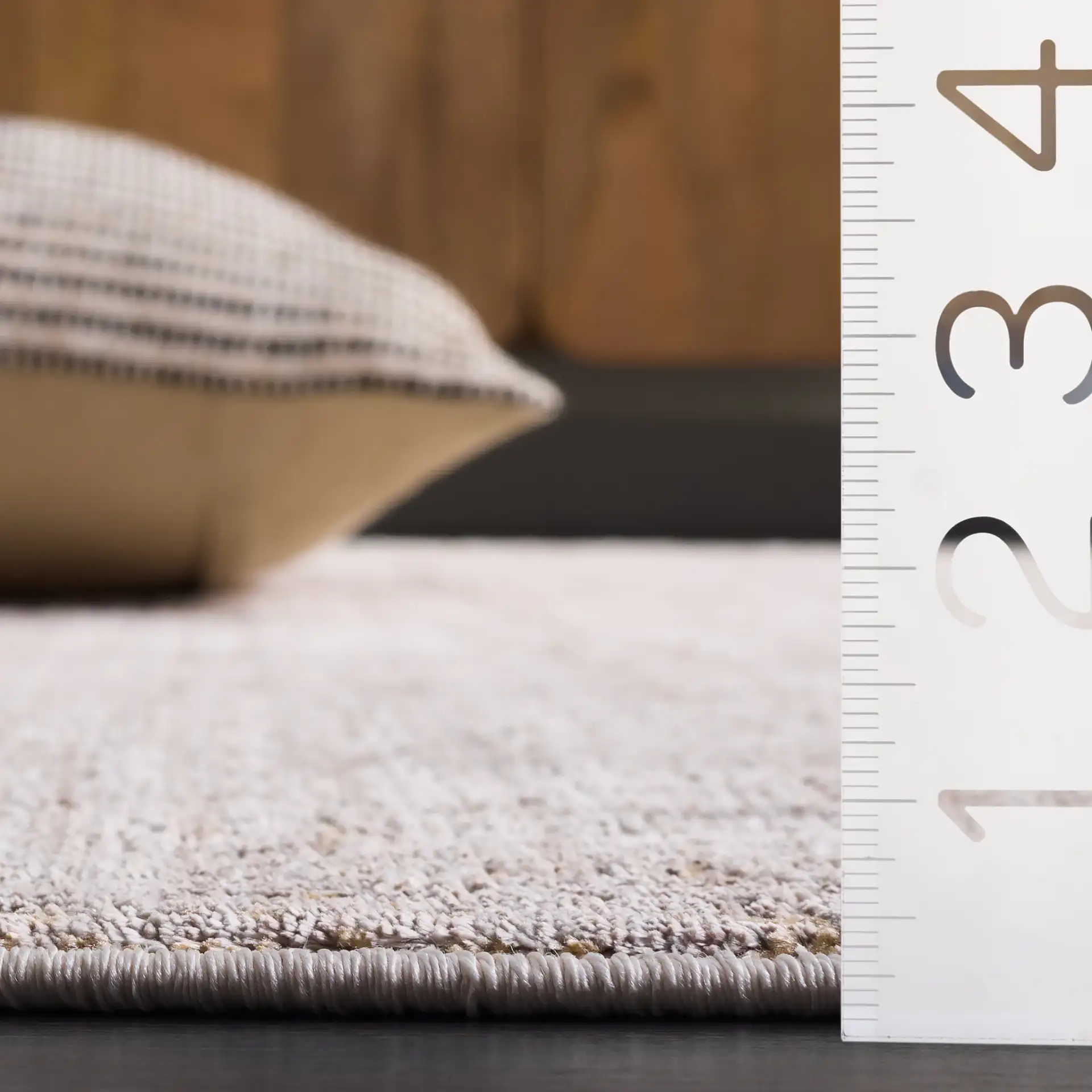 Garnet Distressed Grid Rug in Gold / Gray in a styled room