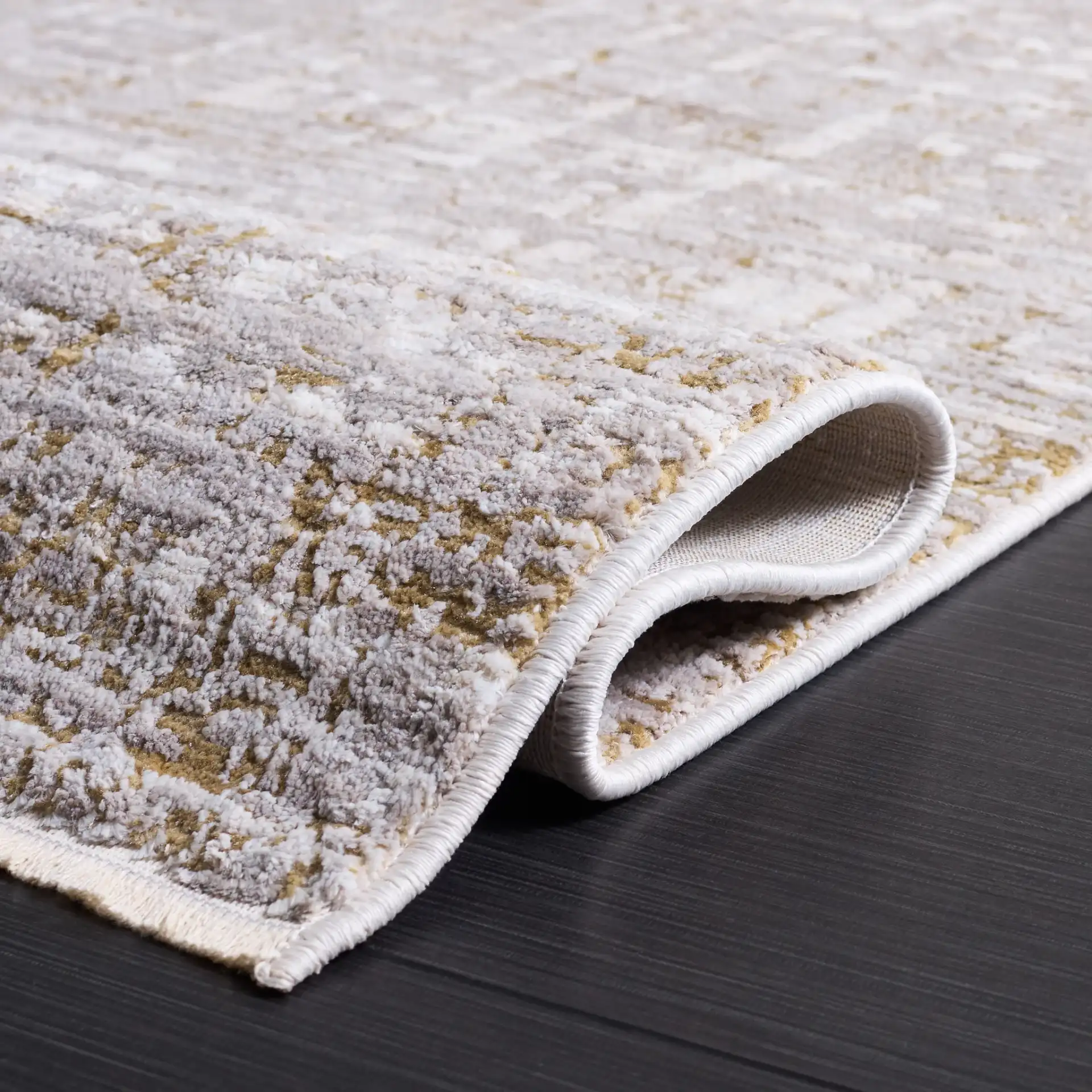Garnet Distressed Grid Rug in Gold / Gray in a styled room