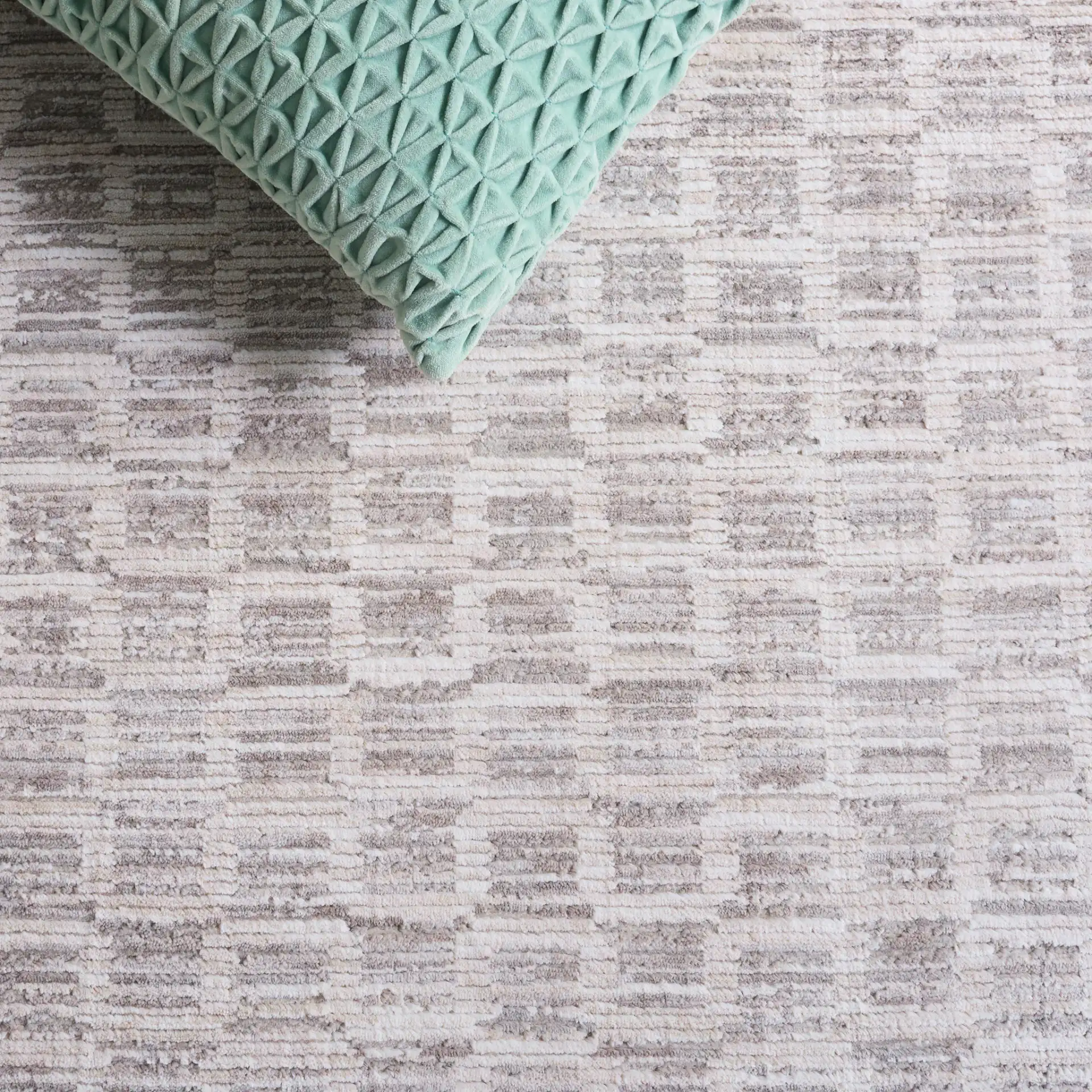 Garnet Grid Rug in Gray / Ivory in a styled room