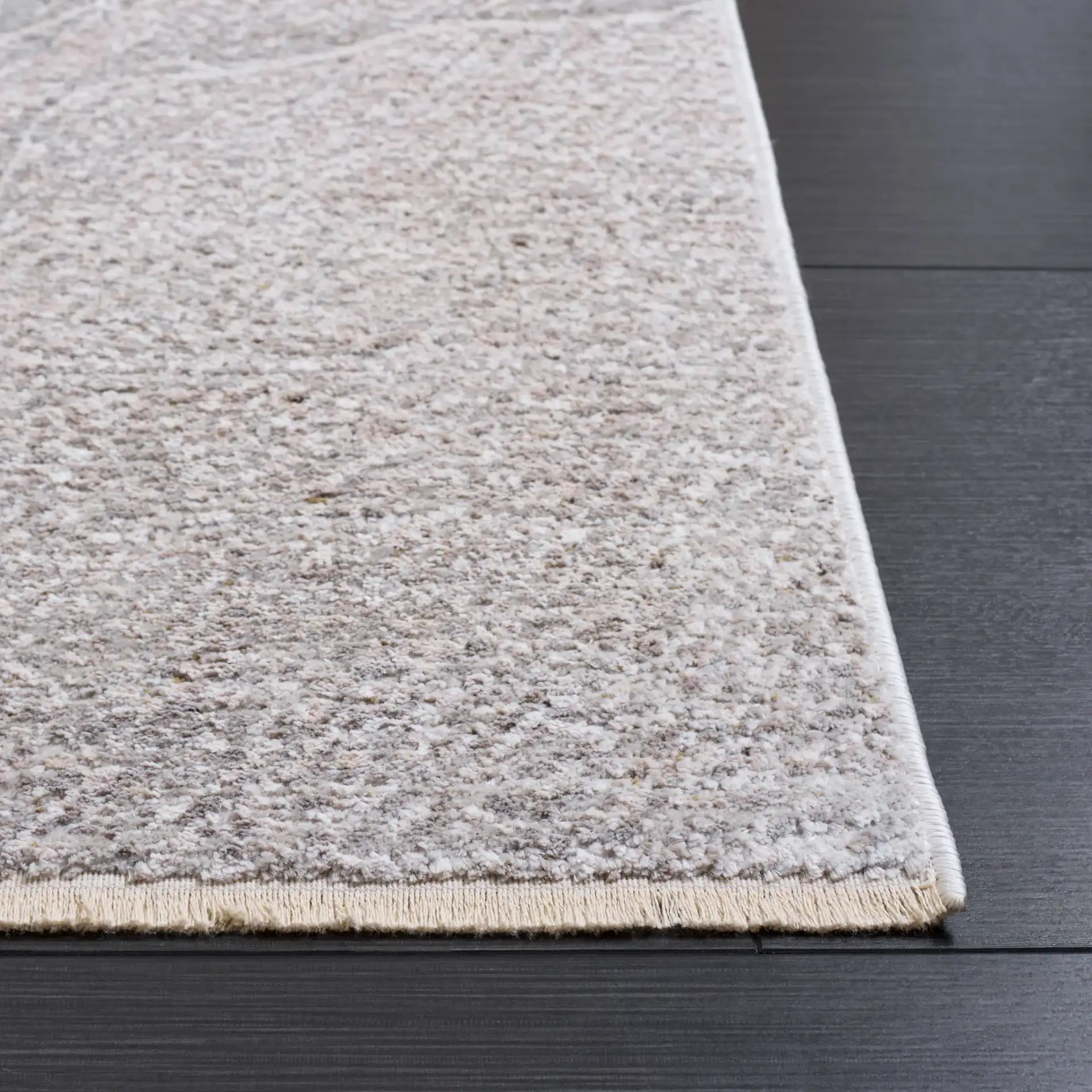 Garnet Abstract Wave Rug in Ivory / Gray in a styled room