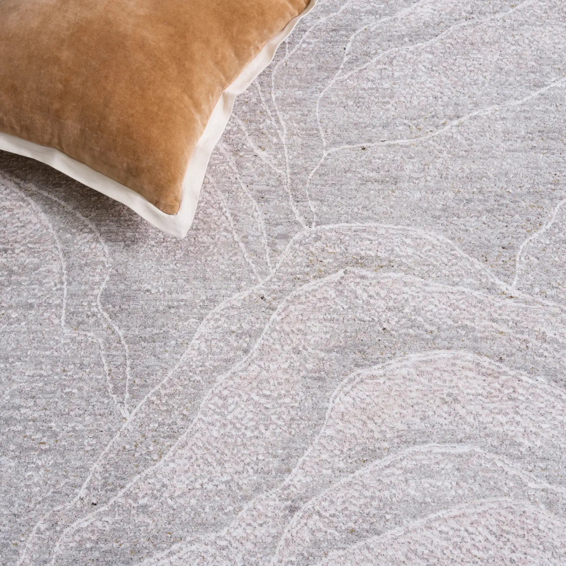 Garnet Abstract Wave Rug in Ivory / Gray in a styled room