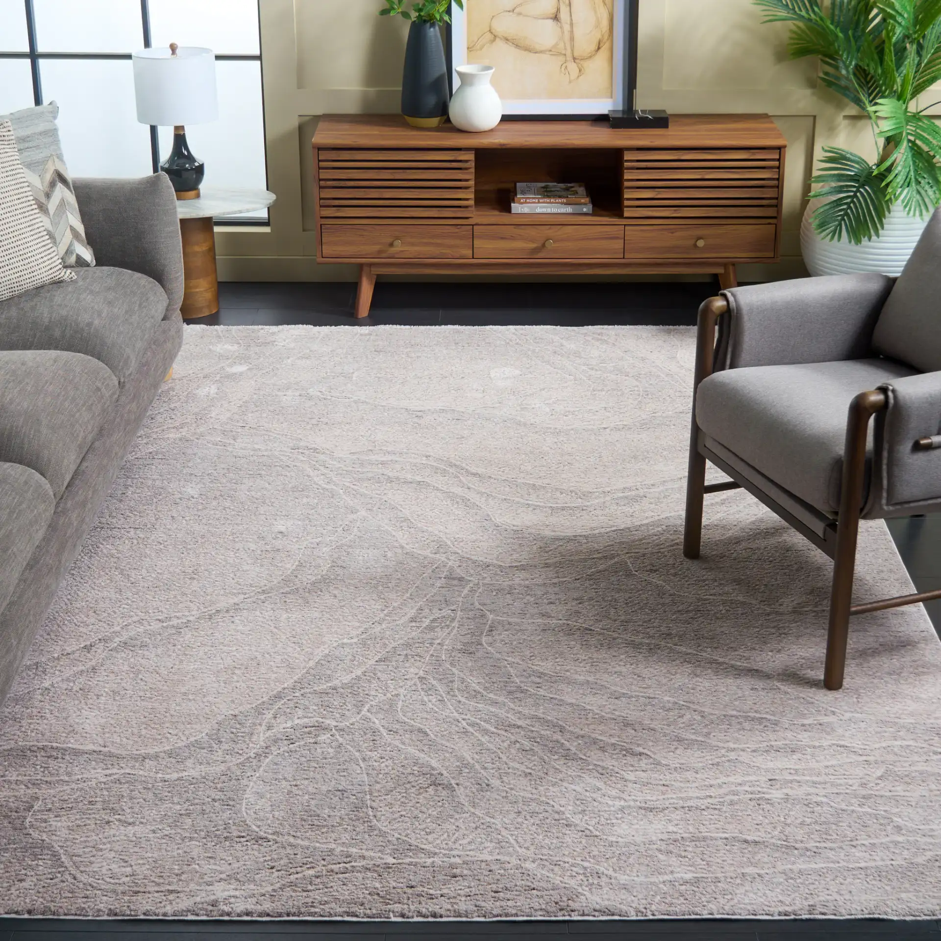 Garnet Abstract Wave Rug in Ivory / Gray in a styled room