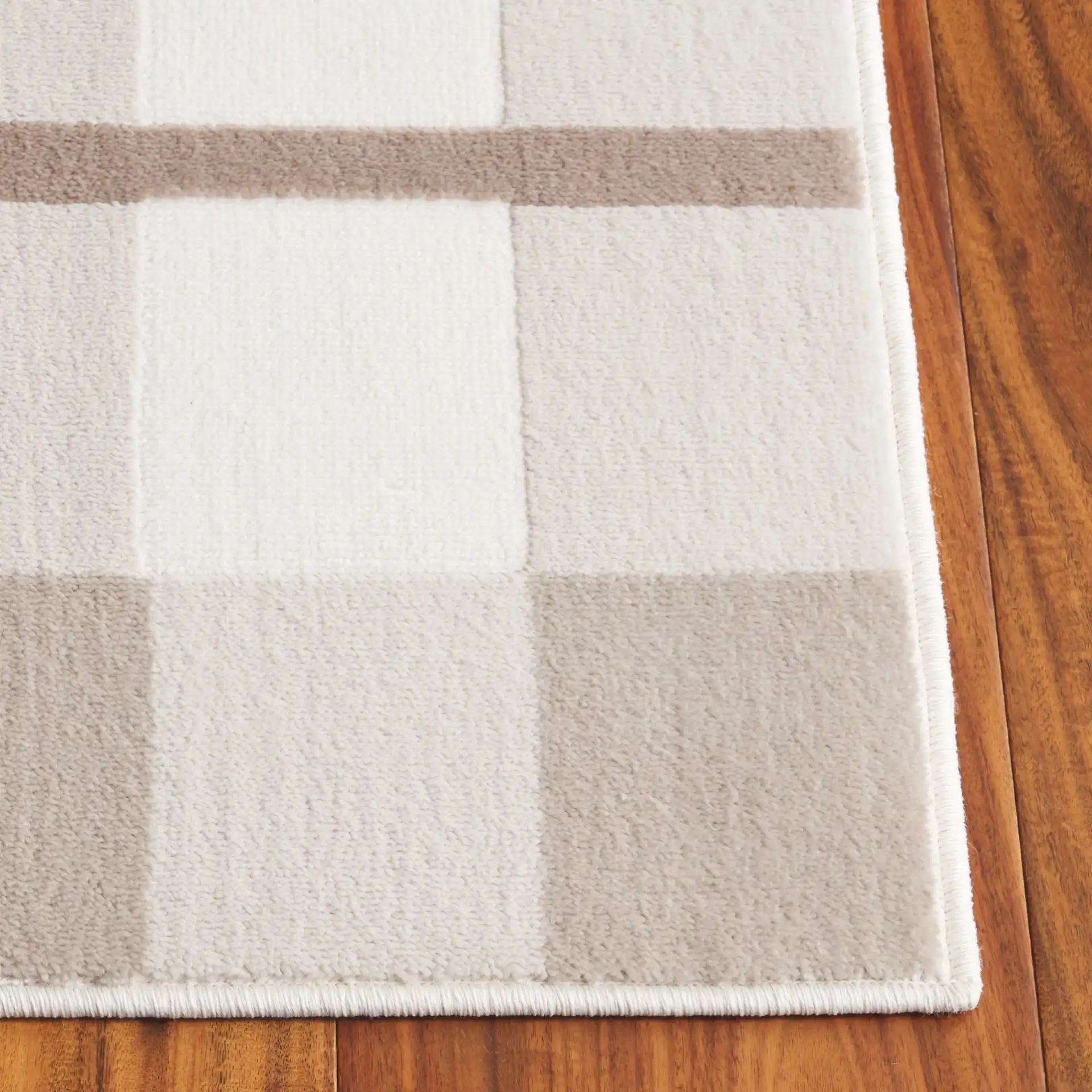 Groove Windowpane Plaid Rug in Beige / Light Blue in a styled room