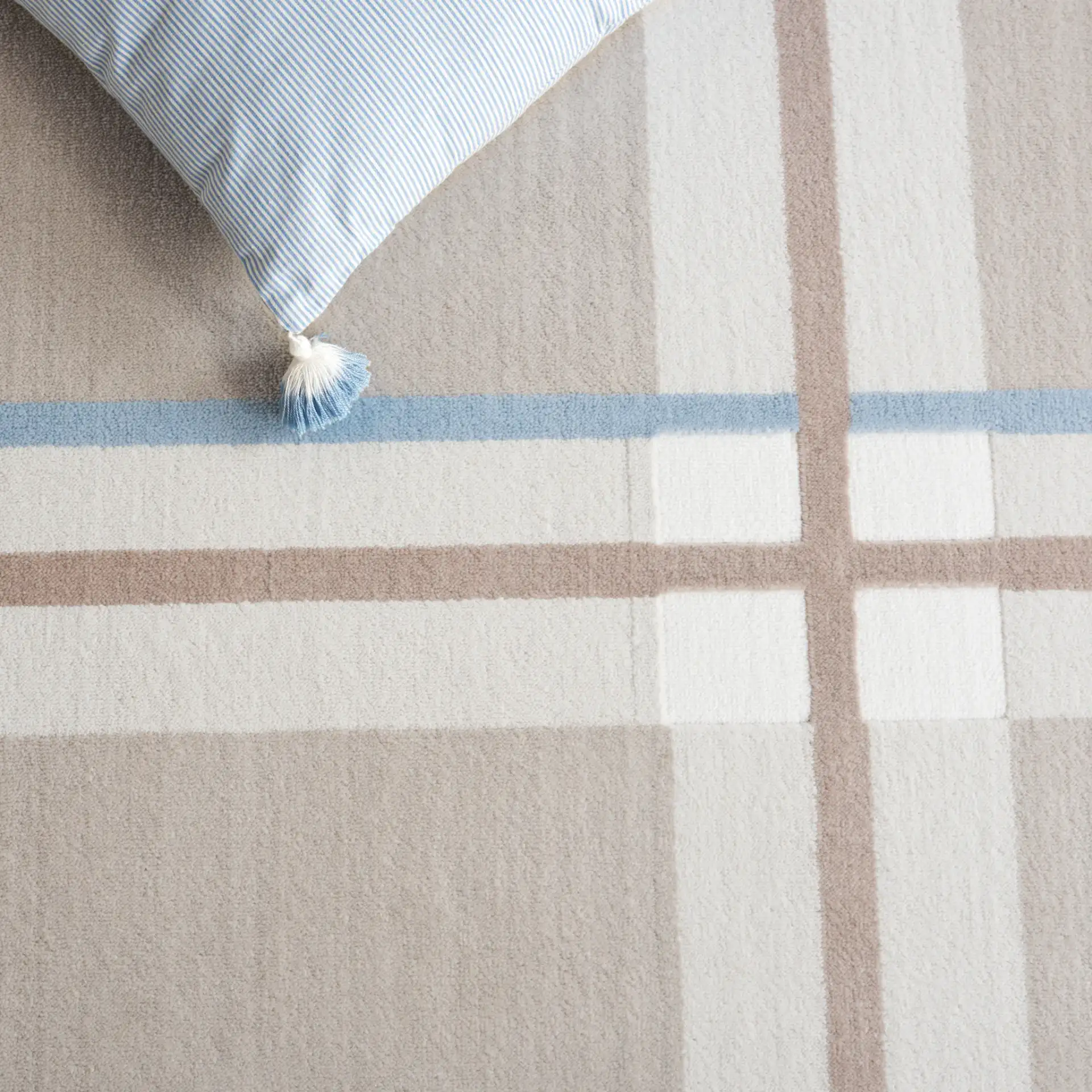 Groove Windowpane Plaid Rug in Beige / Light Blue in a styled room