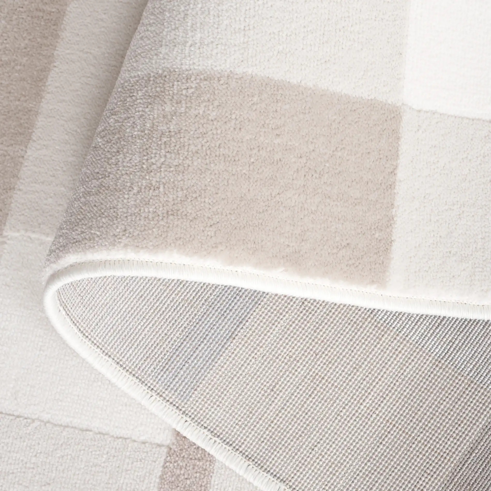 Groove Windowpane Plaid Rug in Beige / Light Blue in a styled room