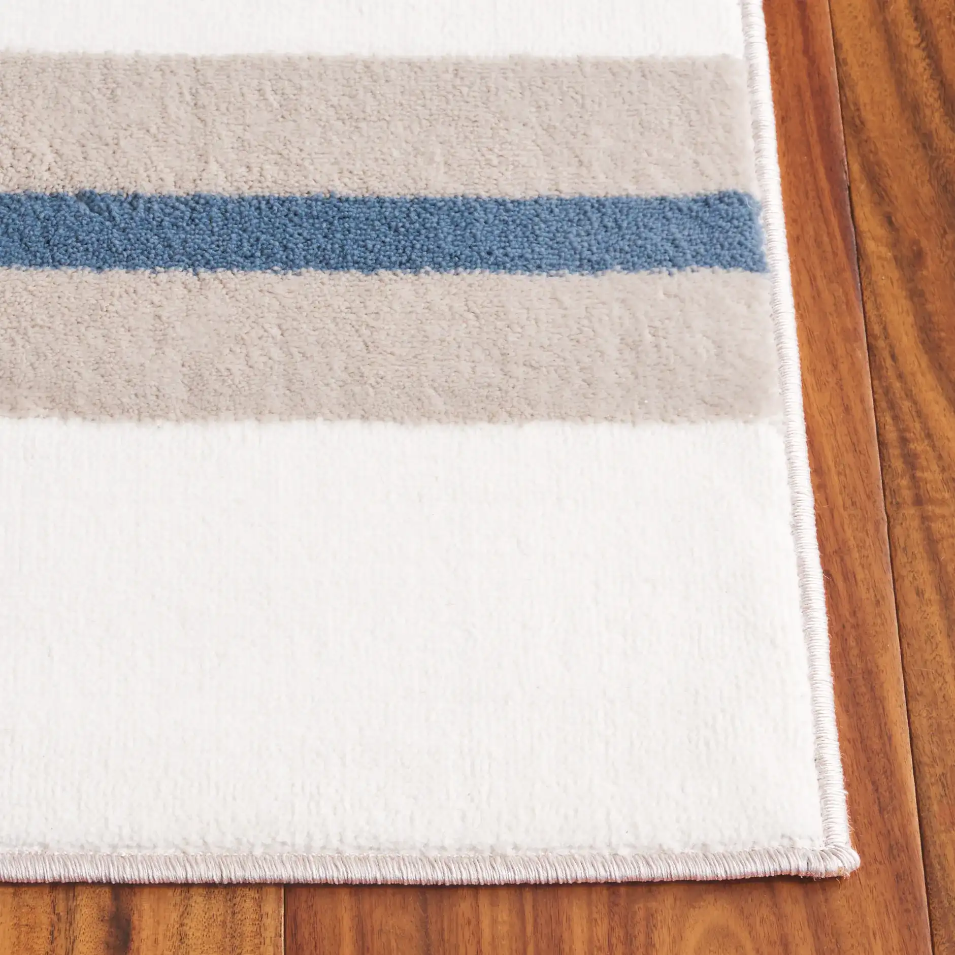 Groove Modern Plaid Rug in Ivory / Blue in a styled room