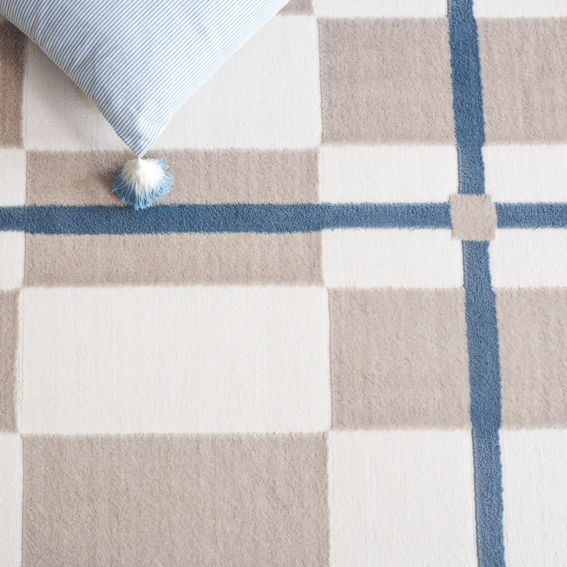 Groove Modern Plaid Rug in Ivory / Blue in a styled room