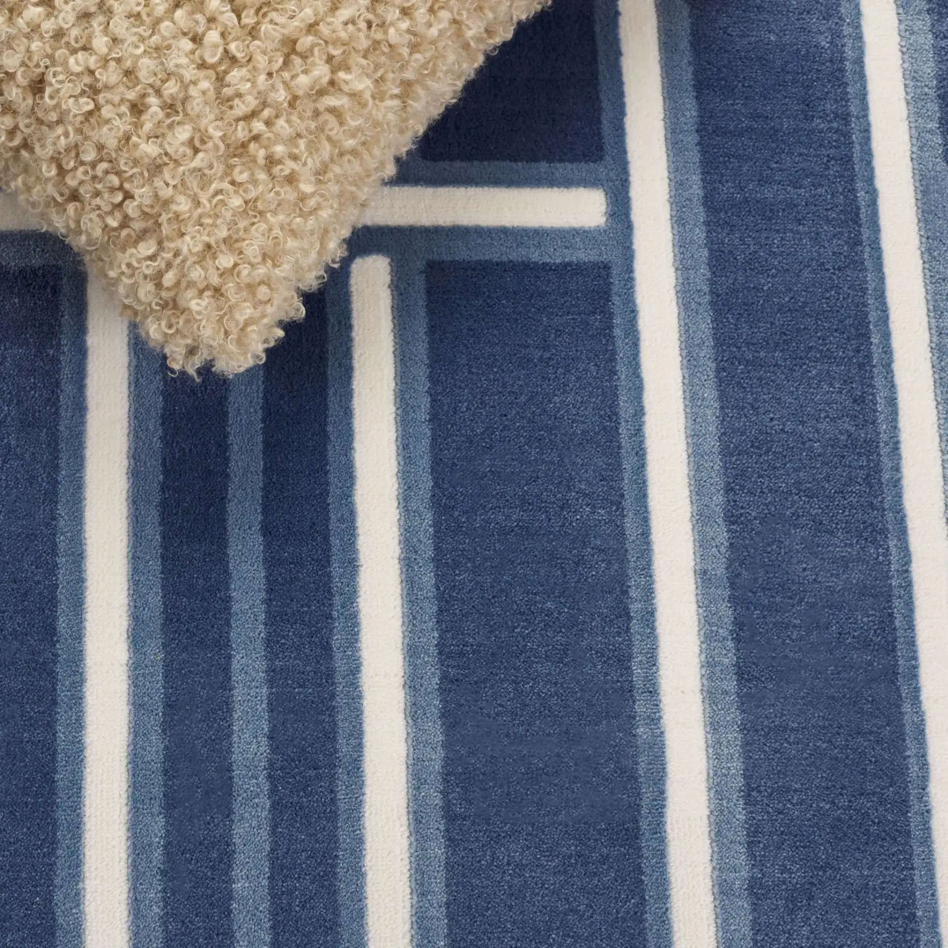 Groove Basketweave Grid Rug in Blue / Ivory in a styled room