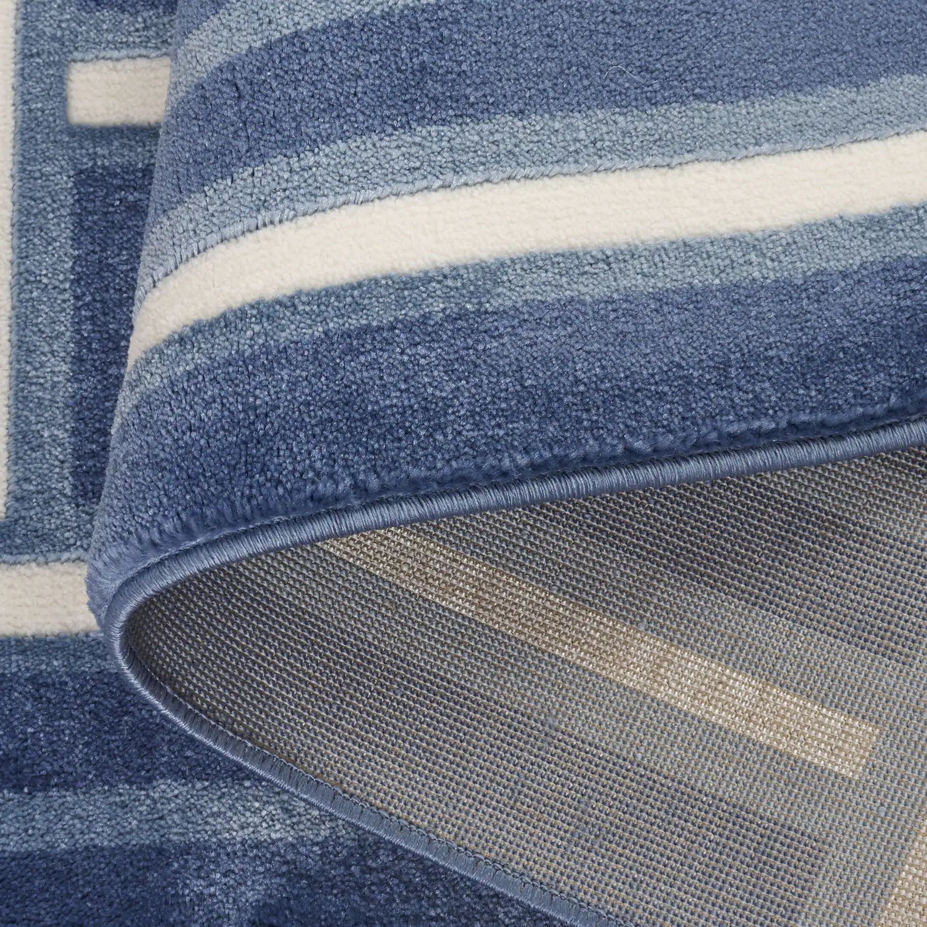 Groove Basketweave Grid Rug in Blue / Ivory in a styled room