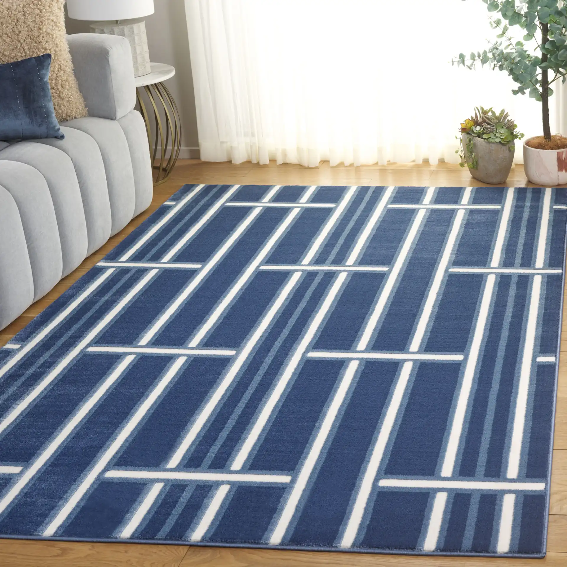 Groove Basketweave Grid Rug in Blue / Ivory in a styled room