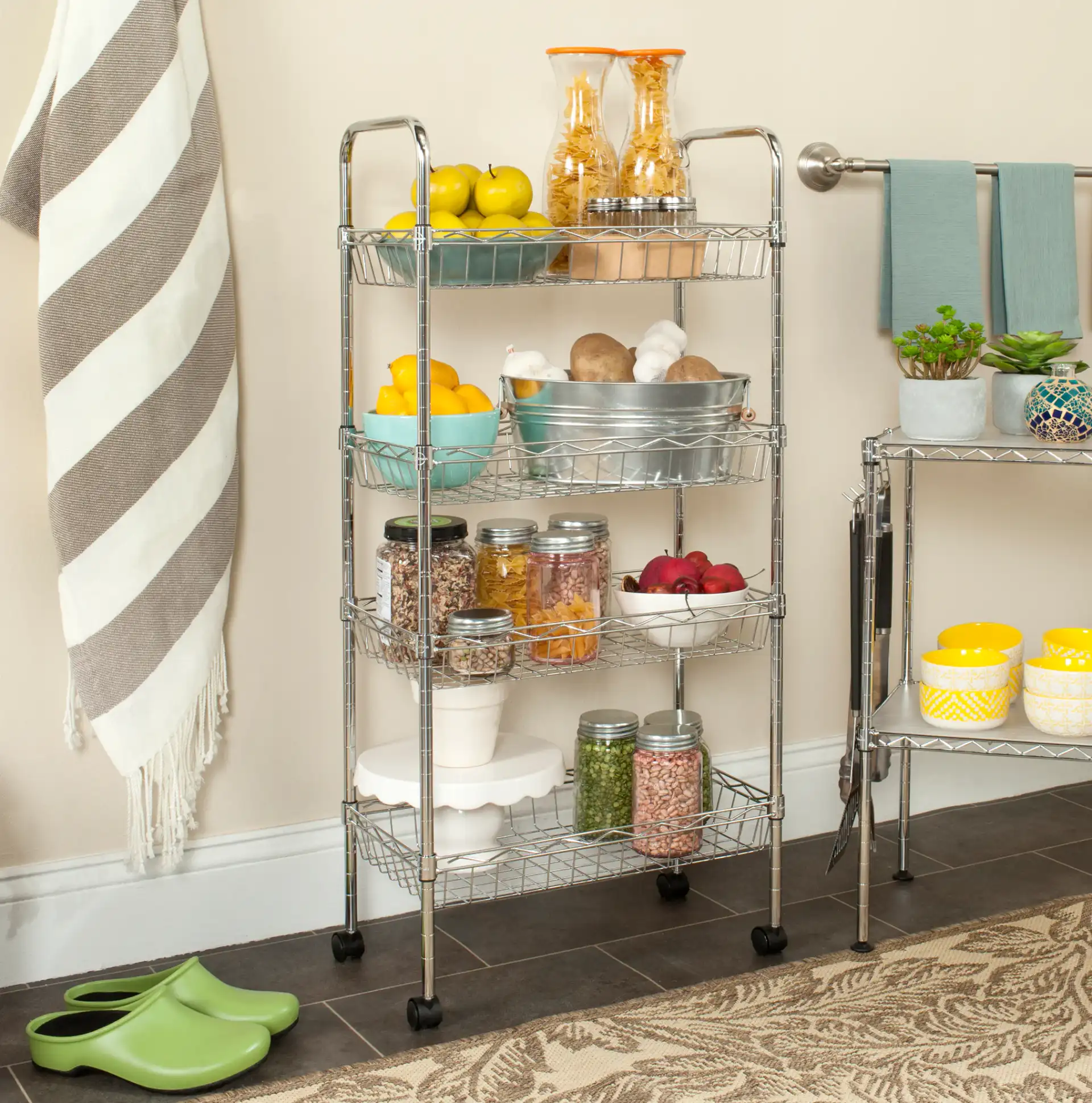 Pierre Adjustable Mini Trolley in Chrome in a styled room