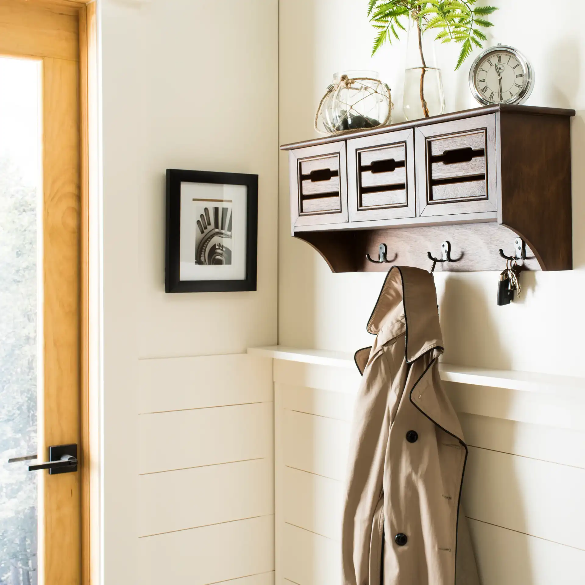 Leon Hanging Three-Drawer Wall Rack in Honey in a styled room